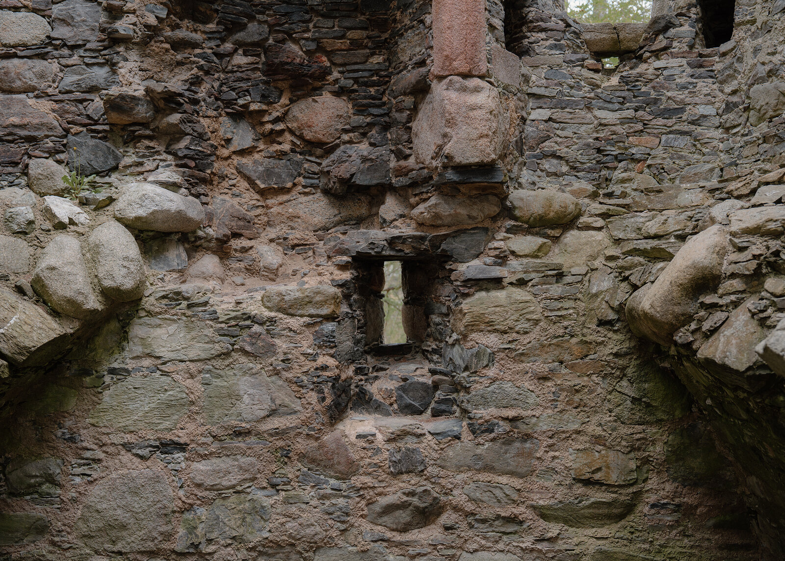 Close detail of Huntly Castle's stonework, a small carved niche set into the wall