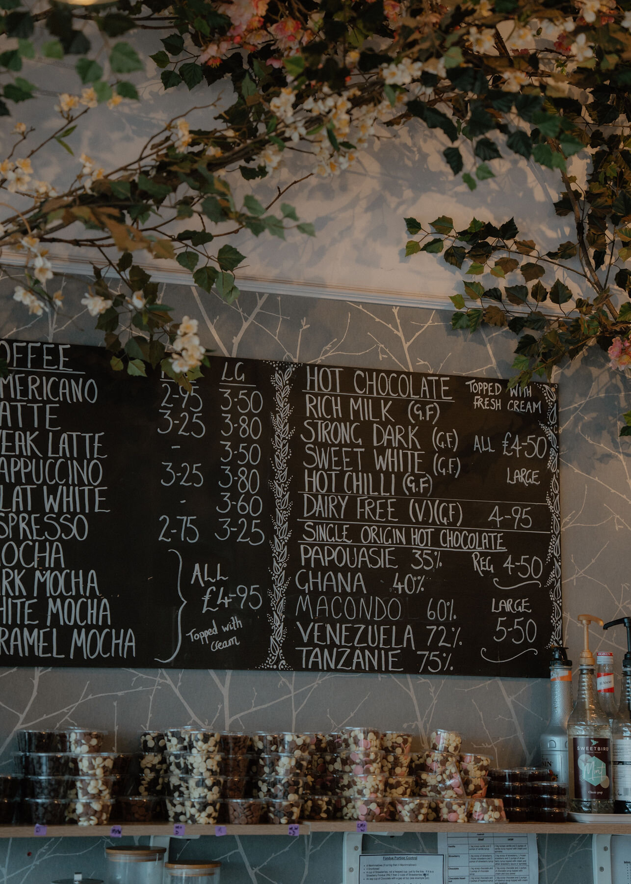 A chalkboard of coffees and hot chocolates, from rich milk to single-origin Venezuela 72 per cent.