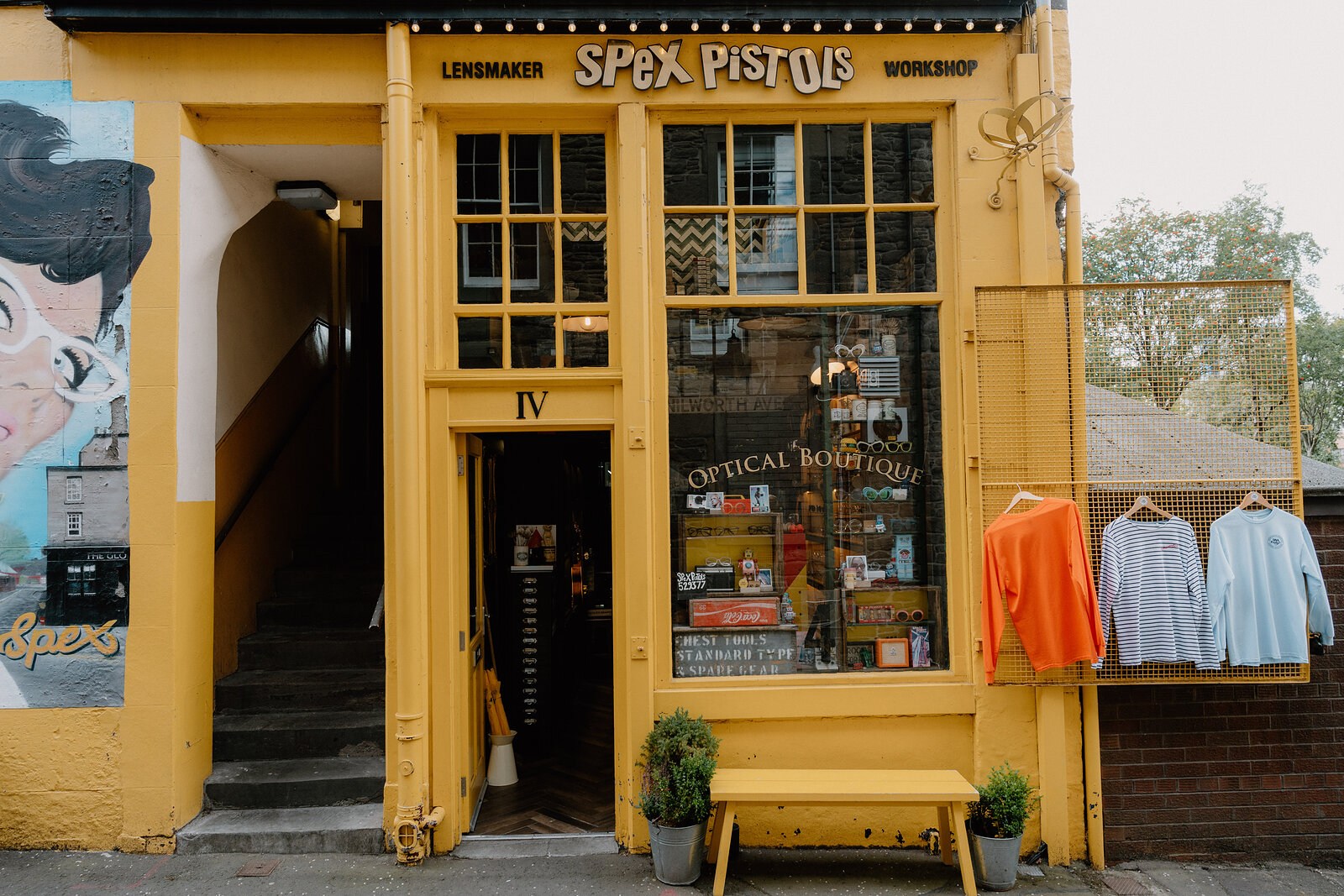 The yellow shopfront of the optical boutique on Johnston's Lane, Dundee.