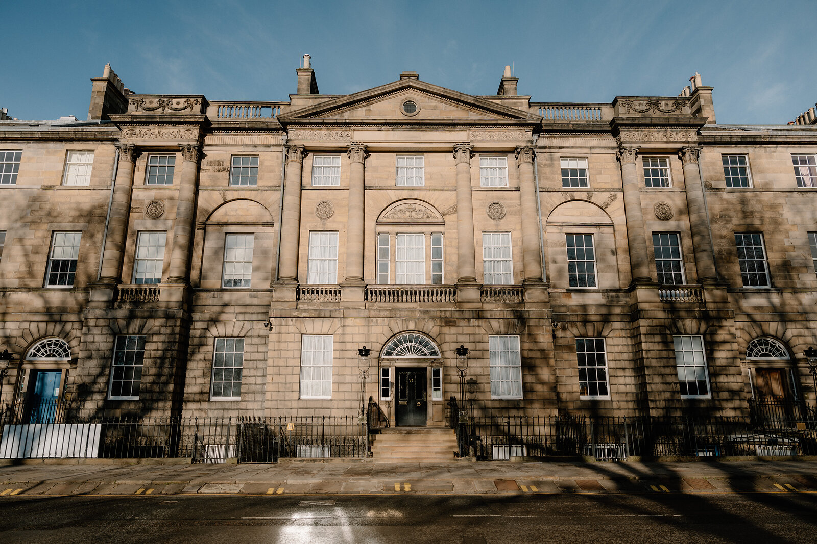 The north side of Charlotte Square, Robert Adam's palace front, with Bute House under the pediment and the Georgian House along the same front at No. 7.