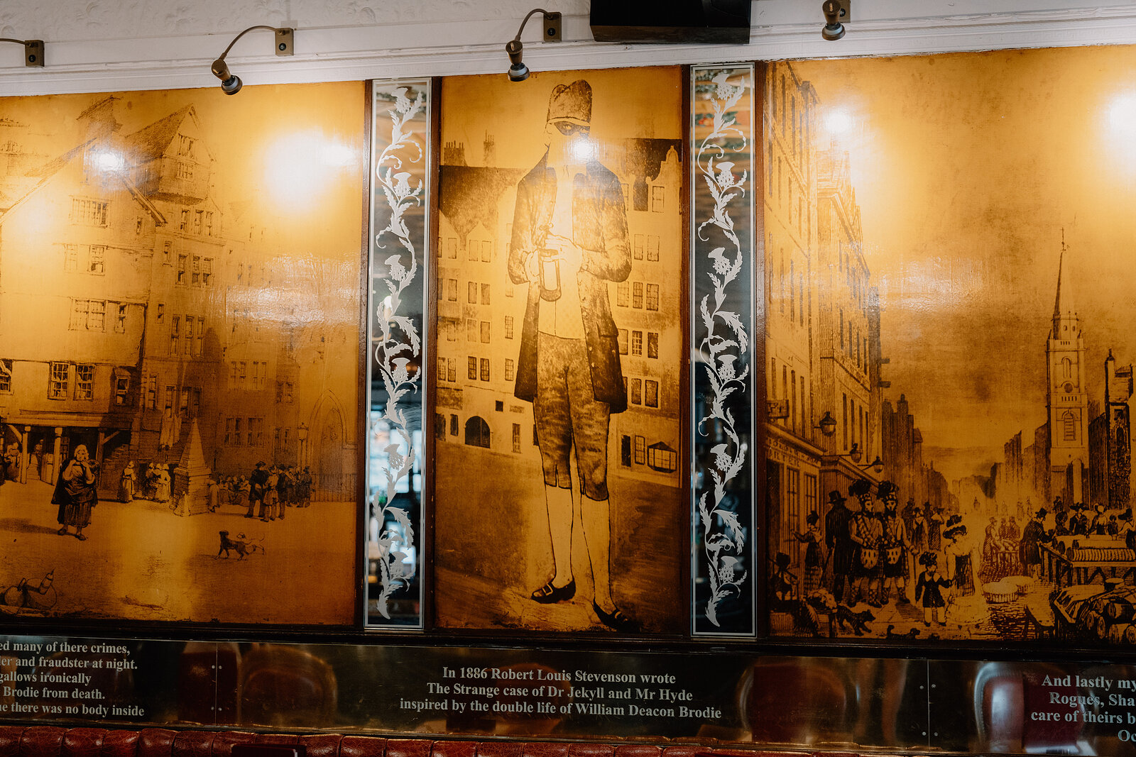 A mural panel recounts Deacon Brodie's story beside a passage about Robert Louis Stevenson's Dr Jekyll and Mr Hyde.