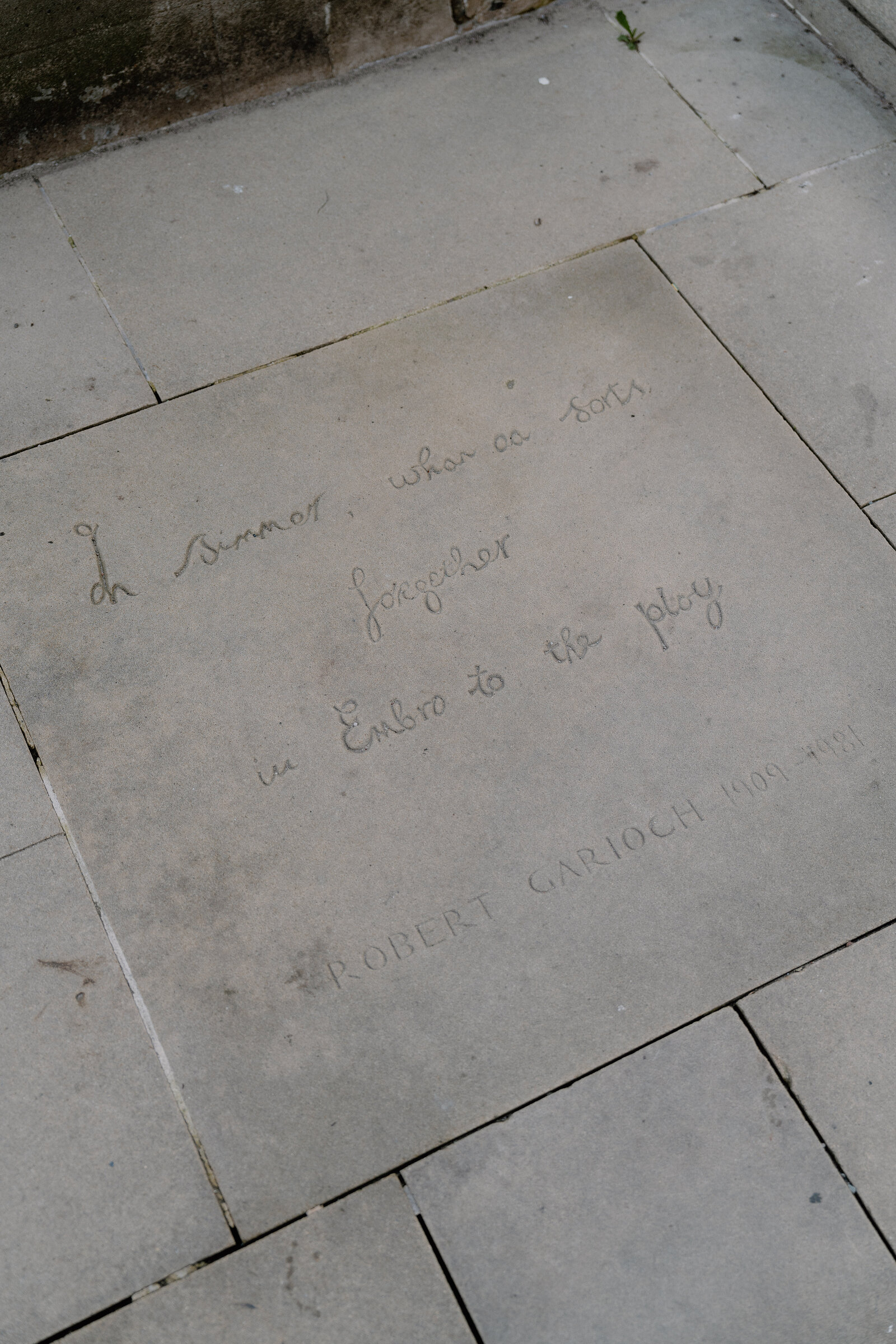 A paving stone at Makars' Court is inscribed with a Scots verse by Robert Garioch.