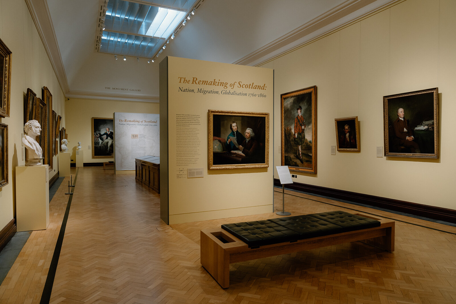 A gallery titled 'The Remaking of Scotland' displays portraits beside a marble bust and a wooden bench.