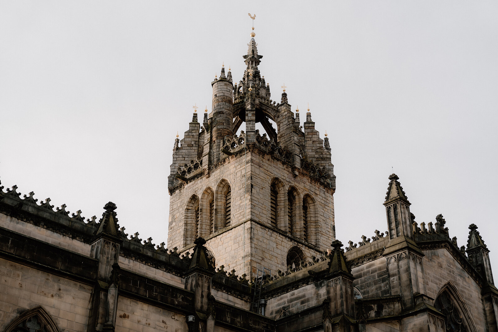 The crown spire of St Giles' Cathedral against an overcast sky