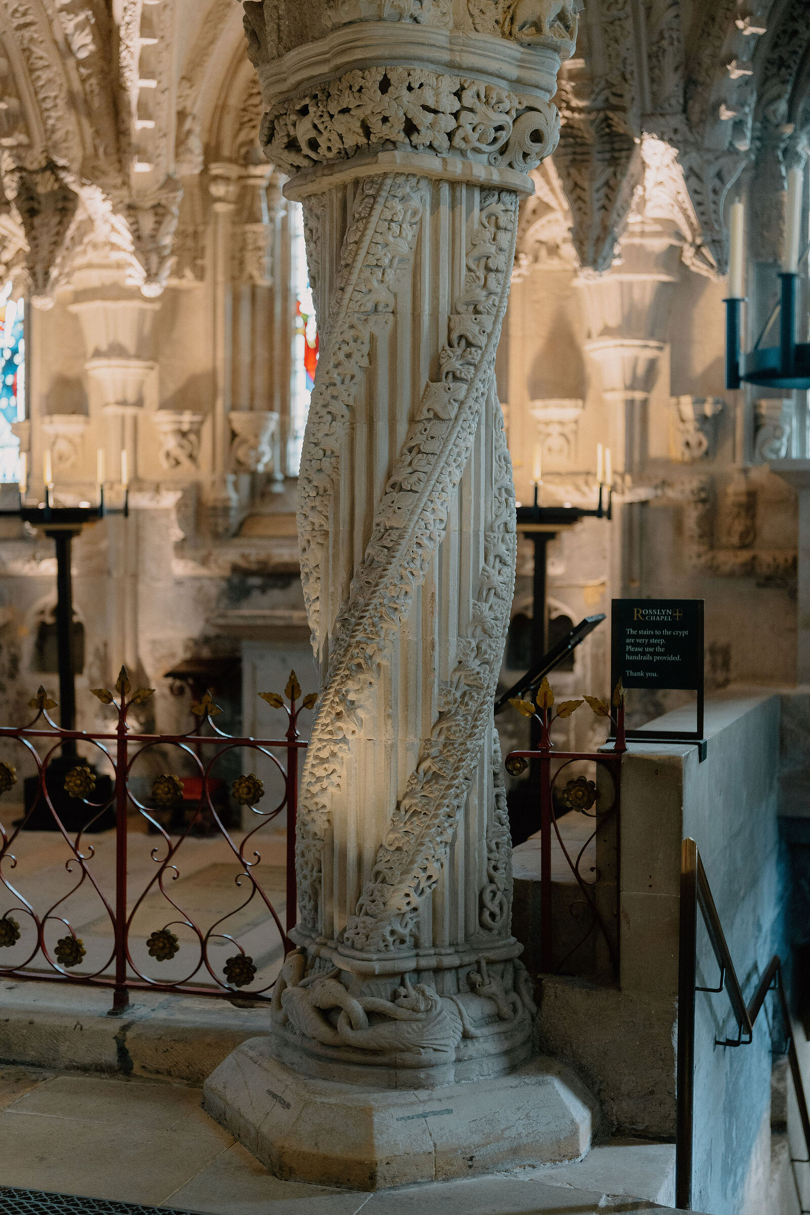 Rosslyn Chapel's carved Apprentice Pillar spirals with intricate stonework.