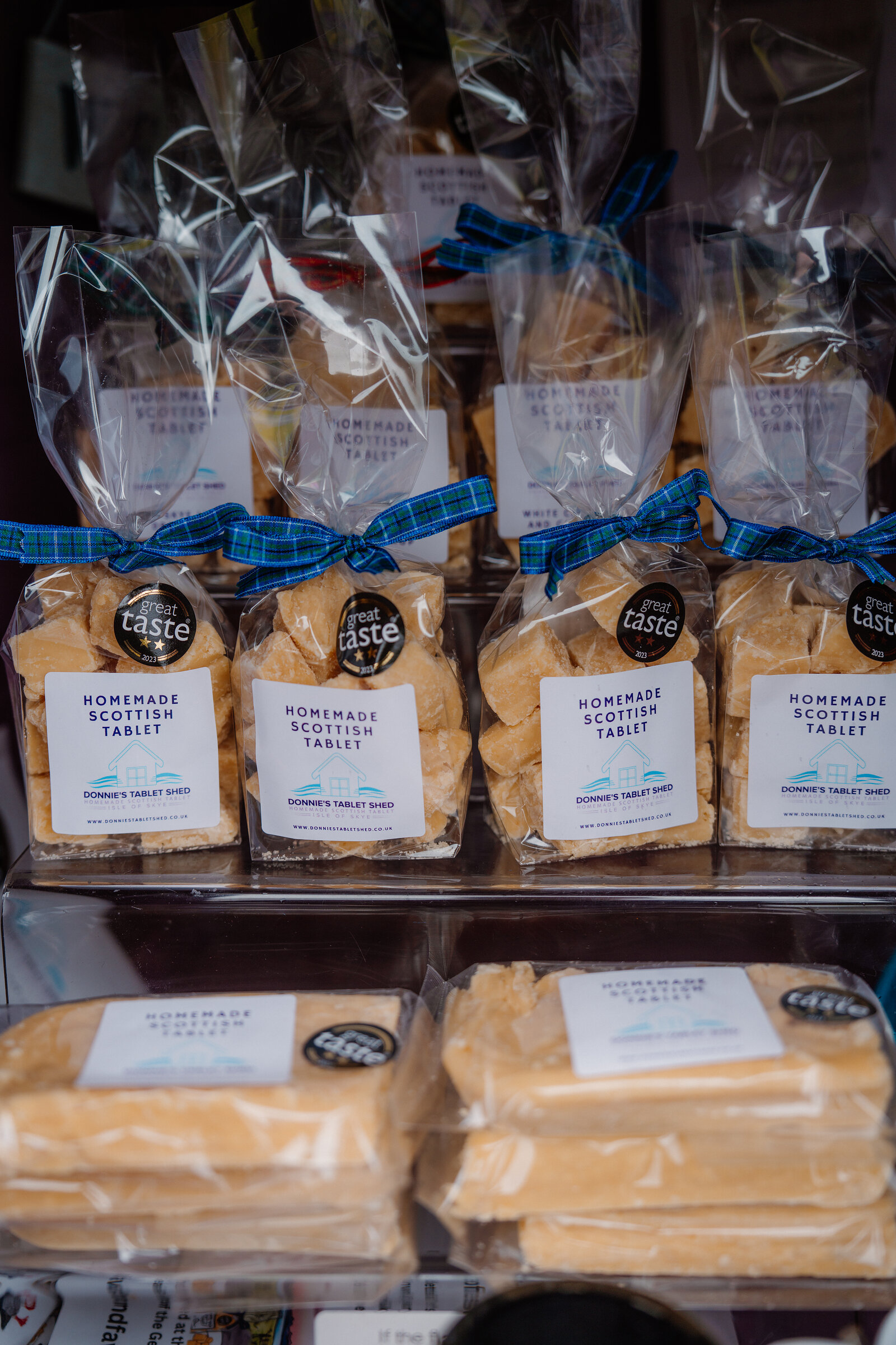 Stacked bags of homemade Scottish tablet from Donnie's Tablet Shed carry a 'Great Taste' award sticker.