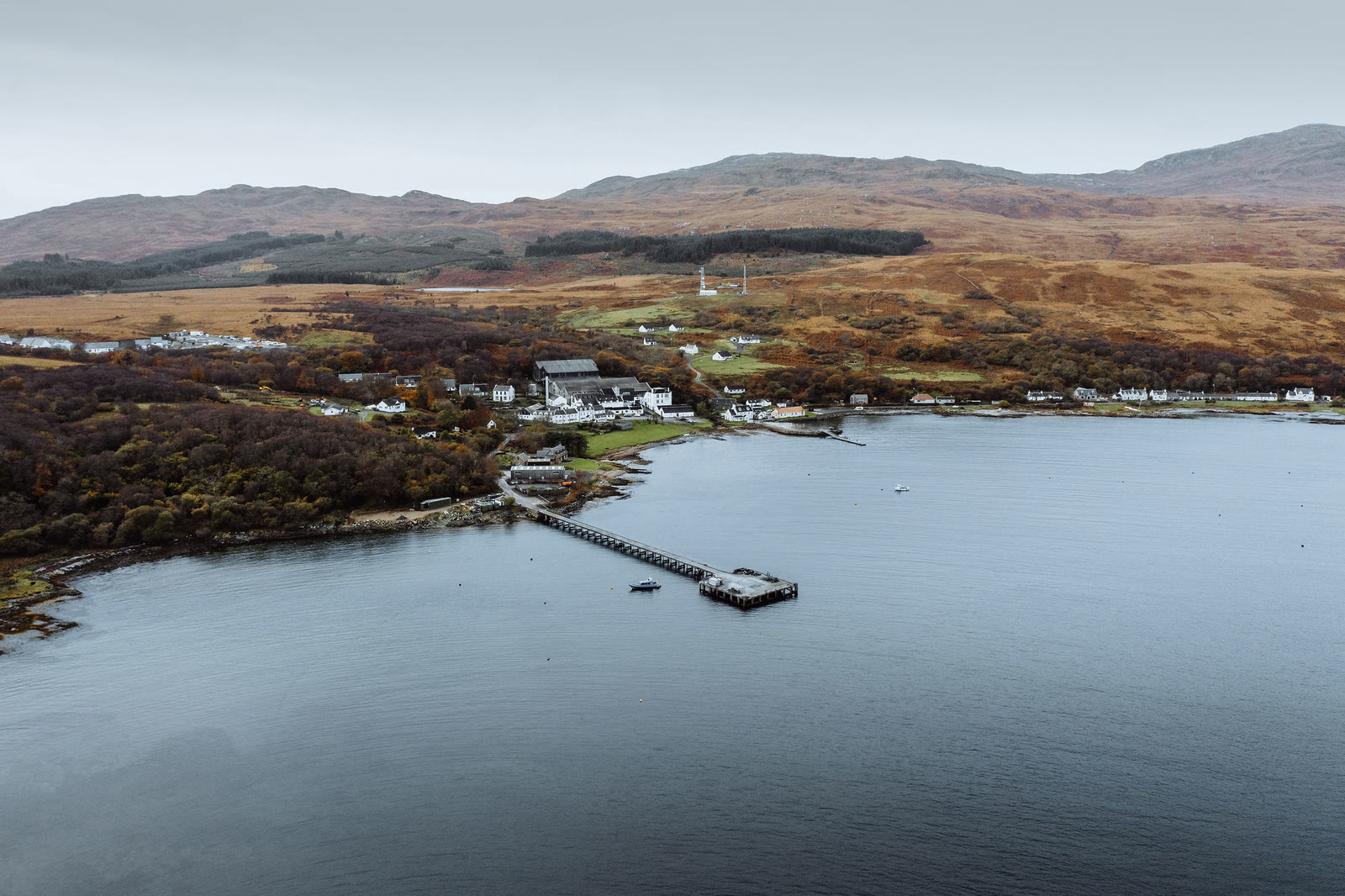 Craighouse, its pier and the distillery from the air.