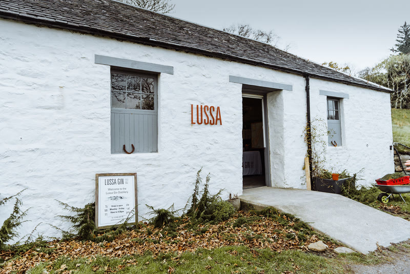 The whitewashed stable buildings of Lussa Gin at Ardlussa.
