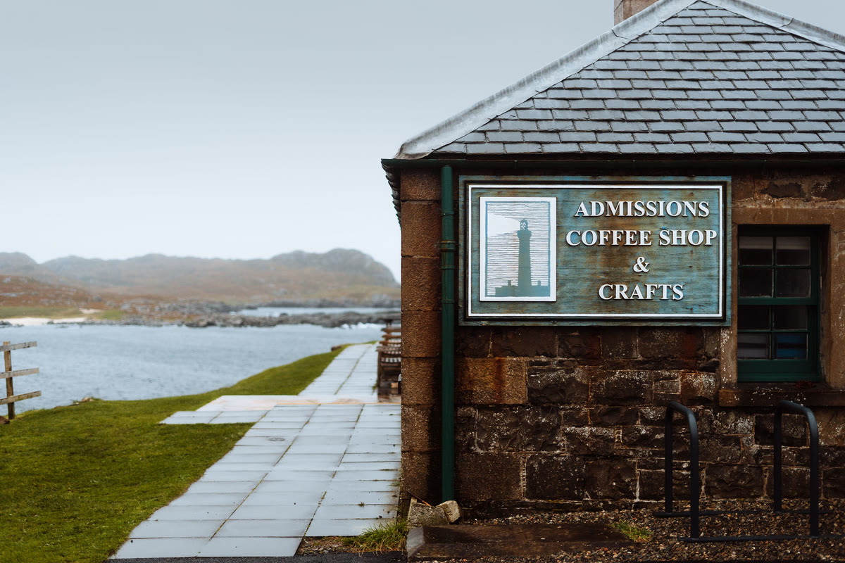 The admissions, coffee shop and crafts sign on the stone building at Ardnamurchan Lighthouse.
