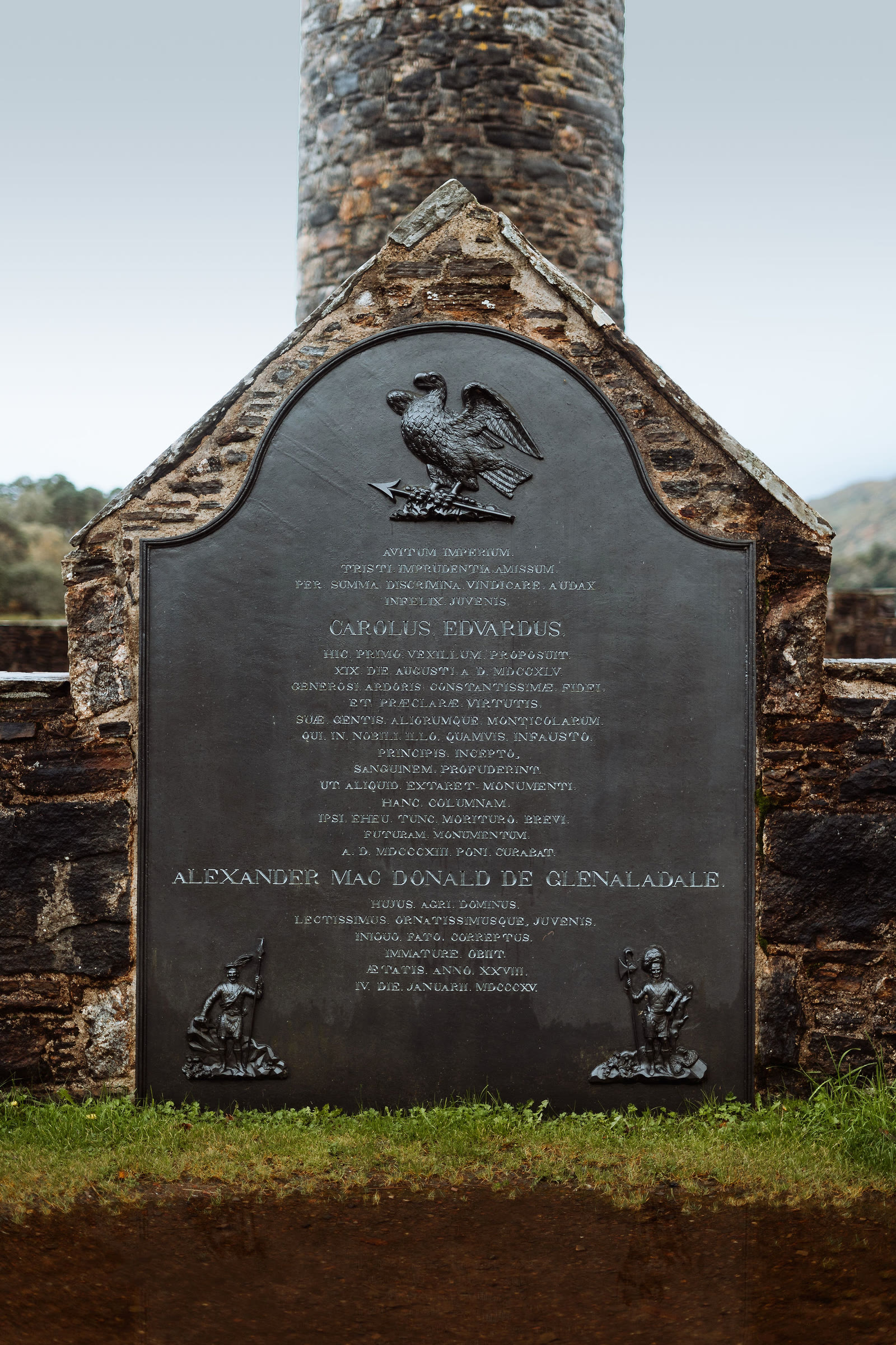 The inscribed plaque at the foot of the Glenfinnan Monument.
