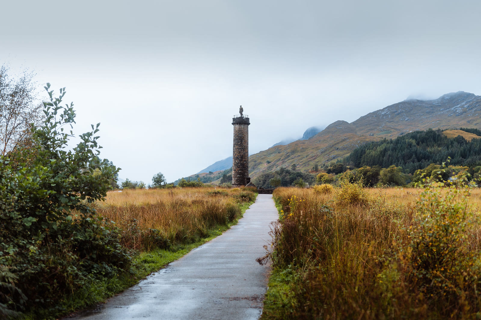 The path through autumn grass to the Glenfinnan Monument.