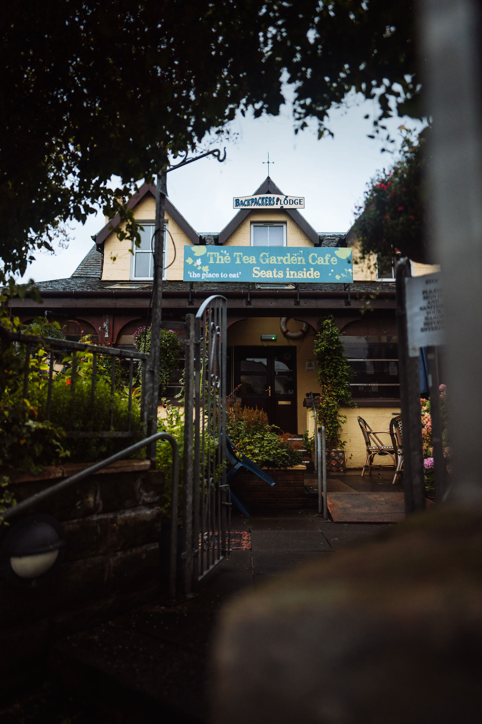 The Tea Garden Cafe in Mallaig seen through its garden gate.
