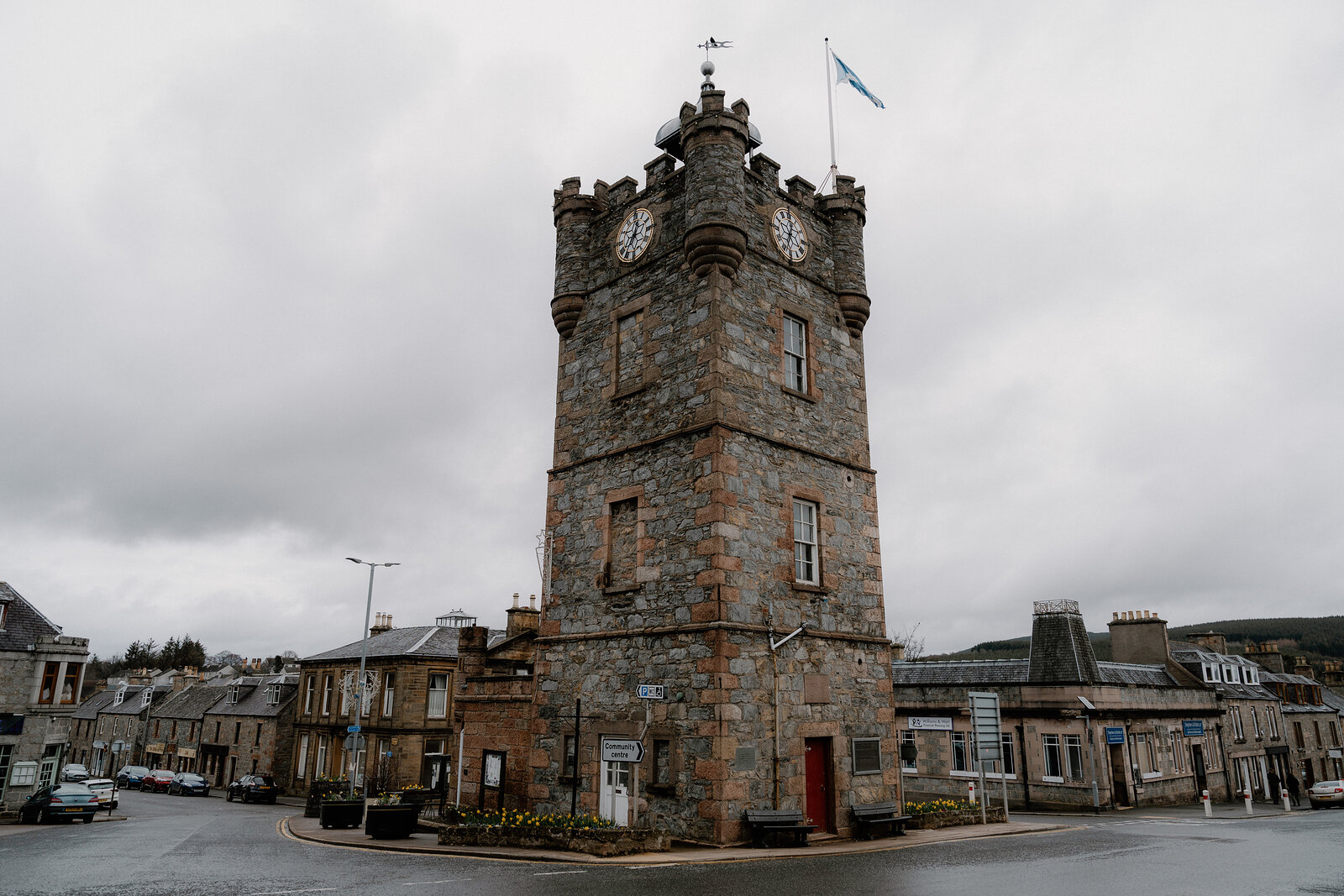 Dufftown's castellated clock tower rises above granite buildings on all four sides of the crossroads.