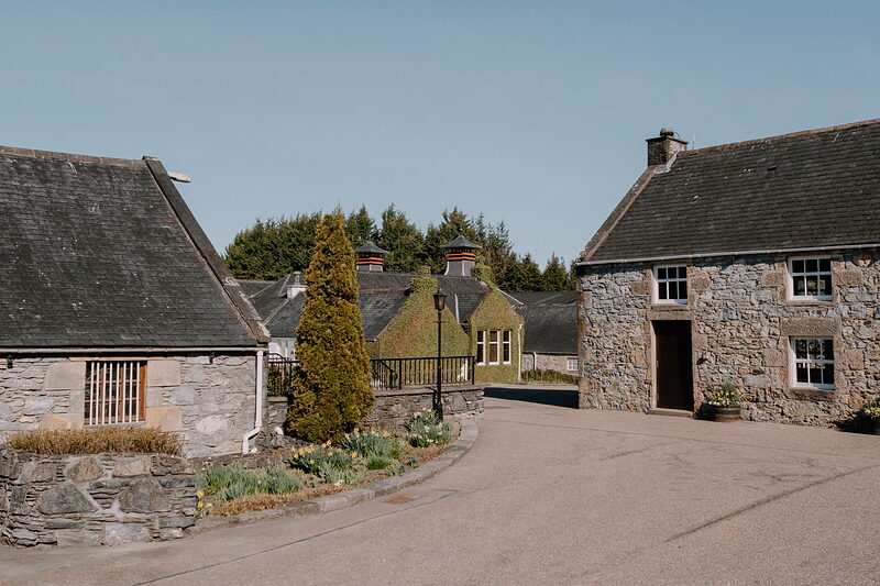 Stone distillery buildings surround a courtyard at Glenfiddich, Moray.