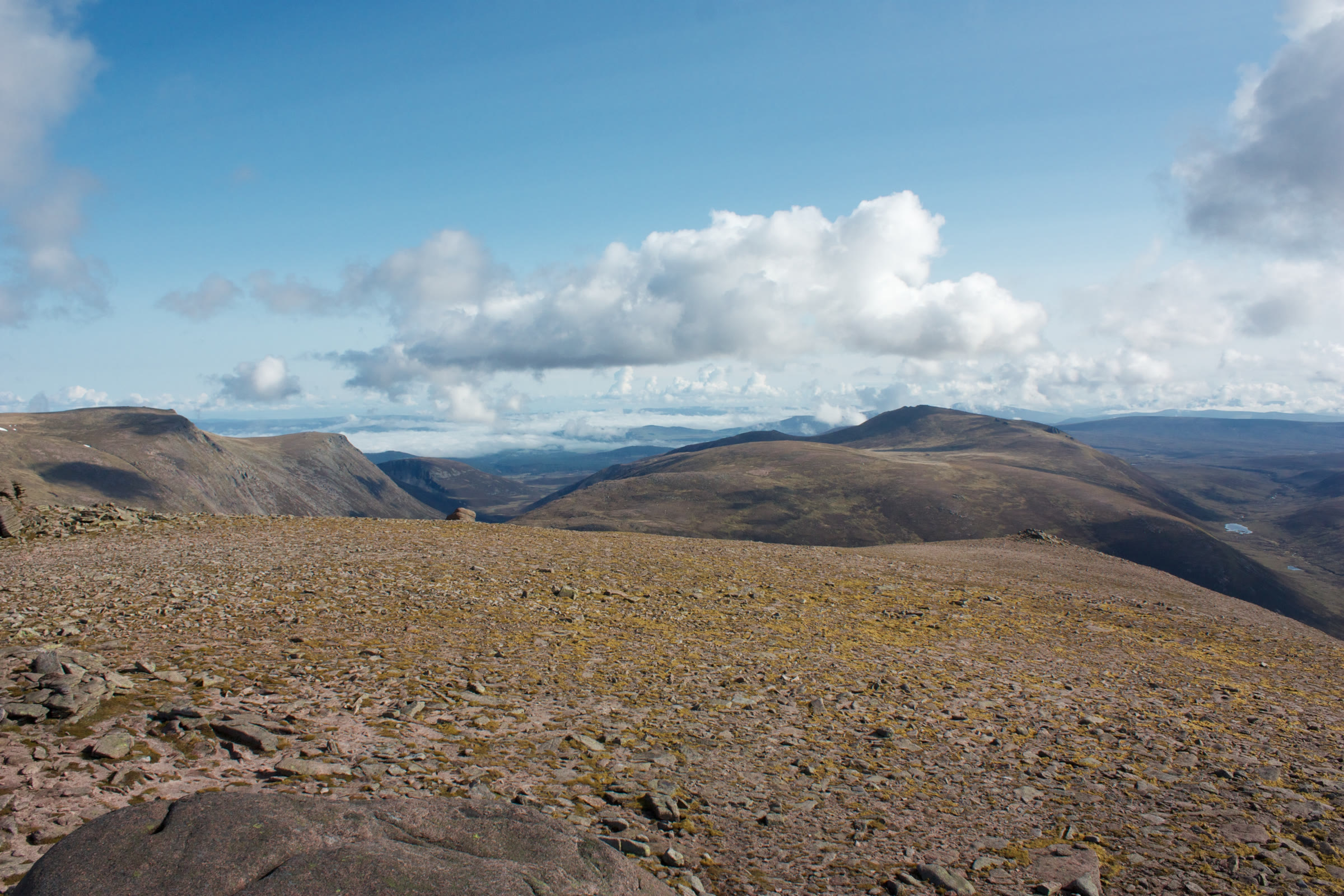 Bynack More beyond Strath Nethy, seen across the stony plateau of Beinn Mheadhoin.