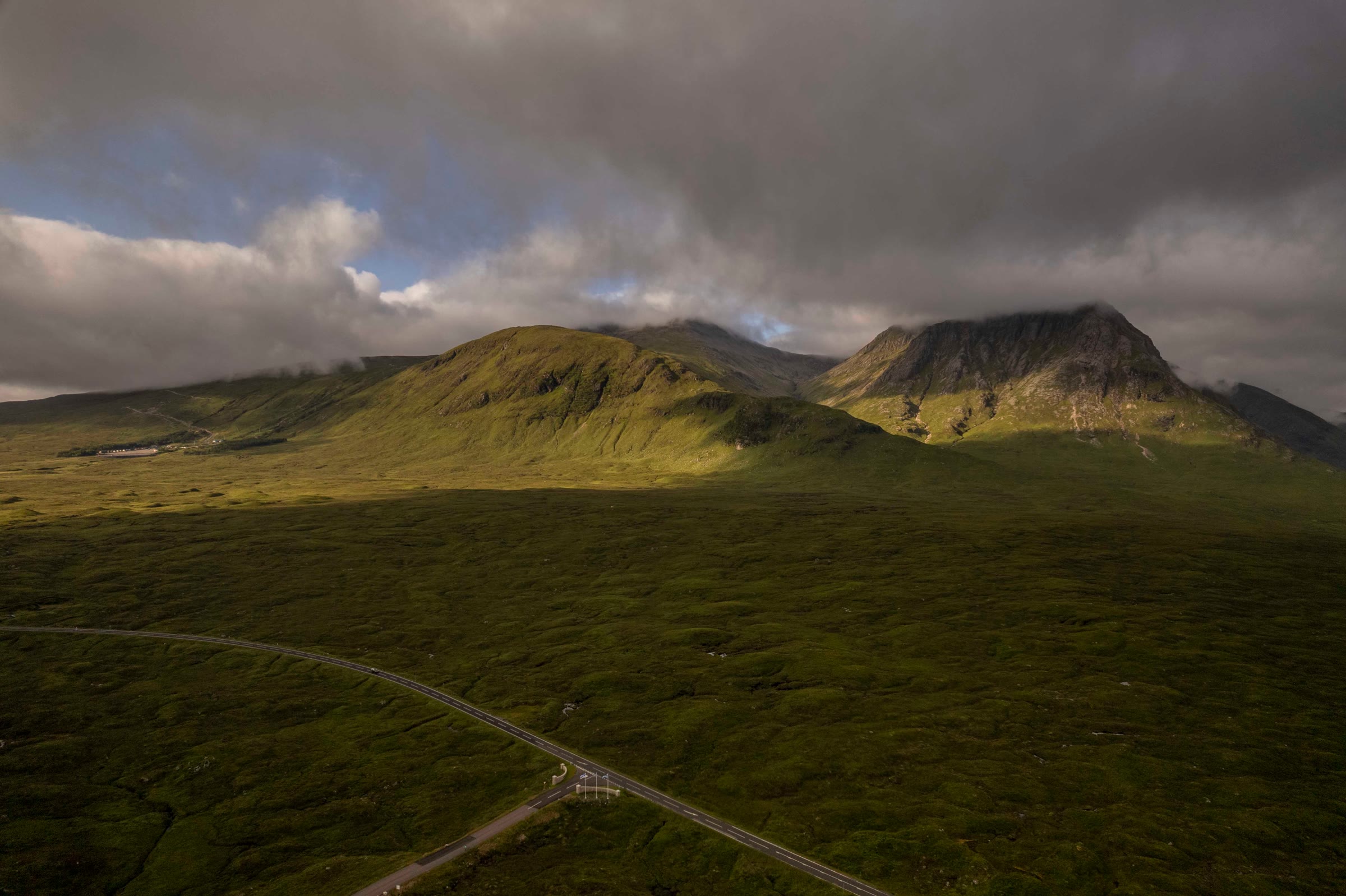 Creise and Meall a' Bhùiridh from the air, the road crossing the moor below.