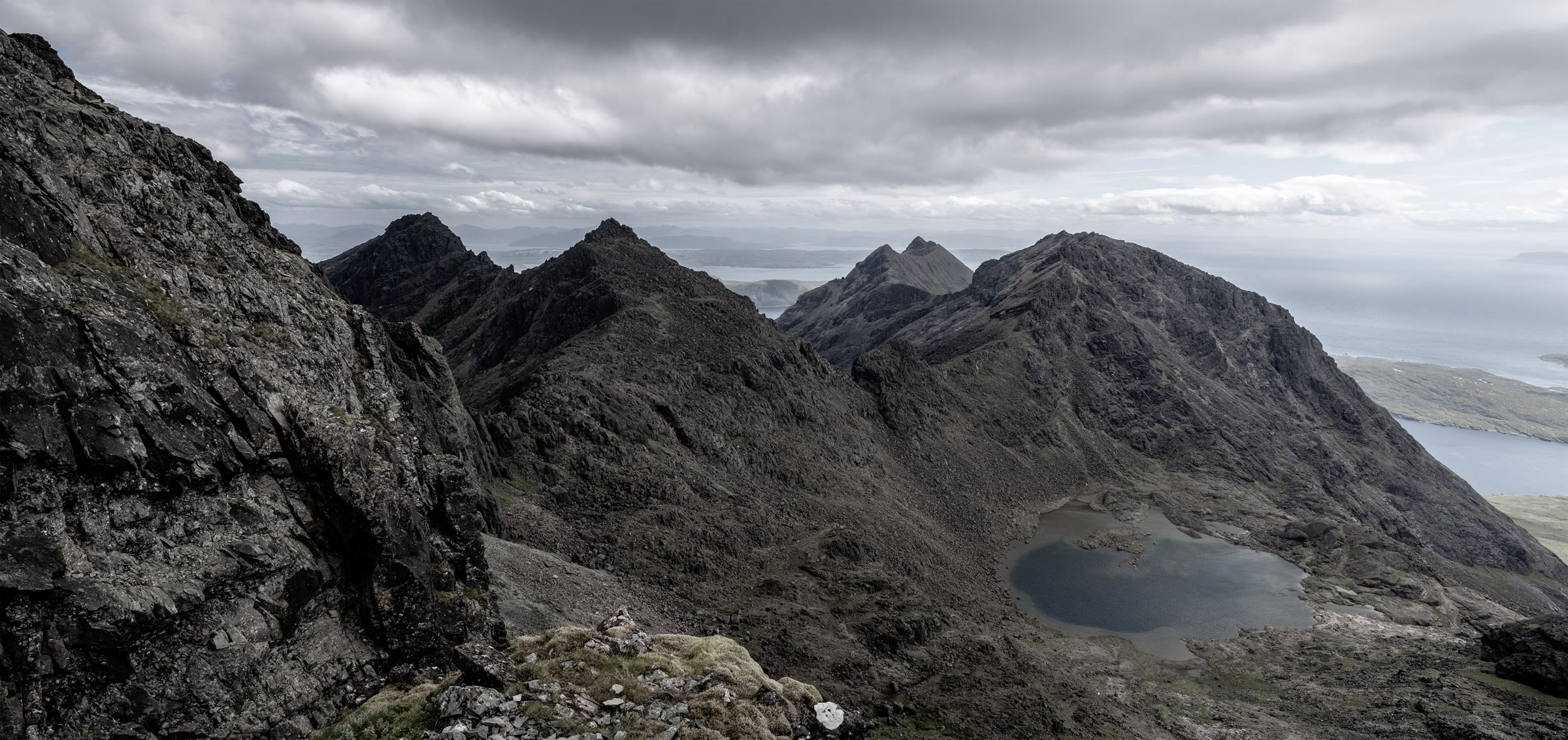 Sgùrr nan Eag and Sgùrr Dubh Mòr above the loch in Coir' a' Ghrunnda.