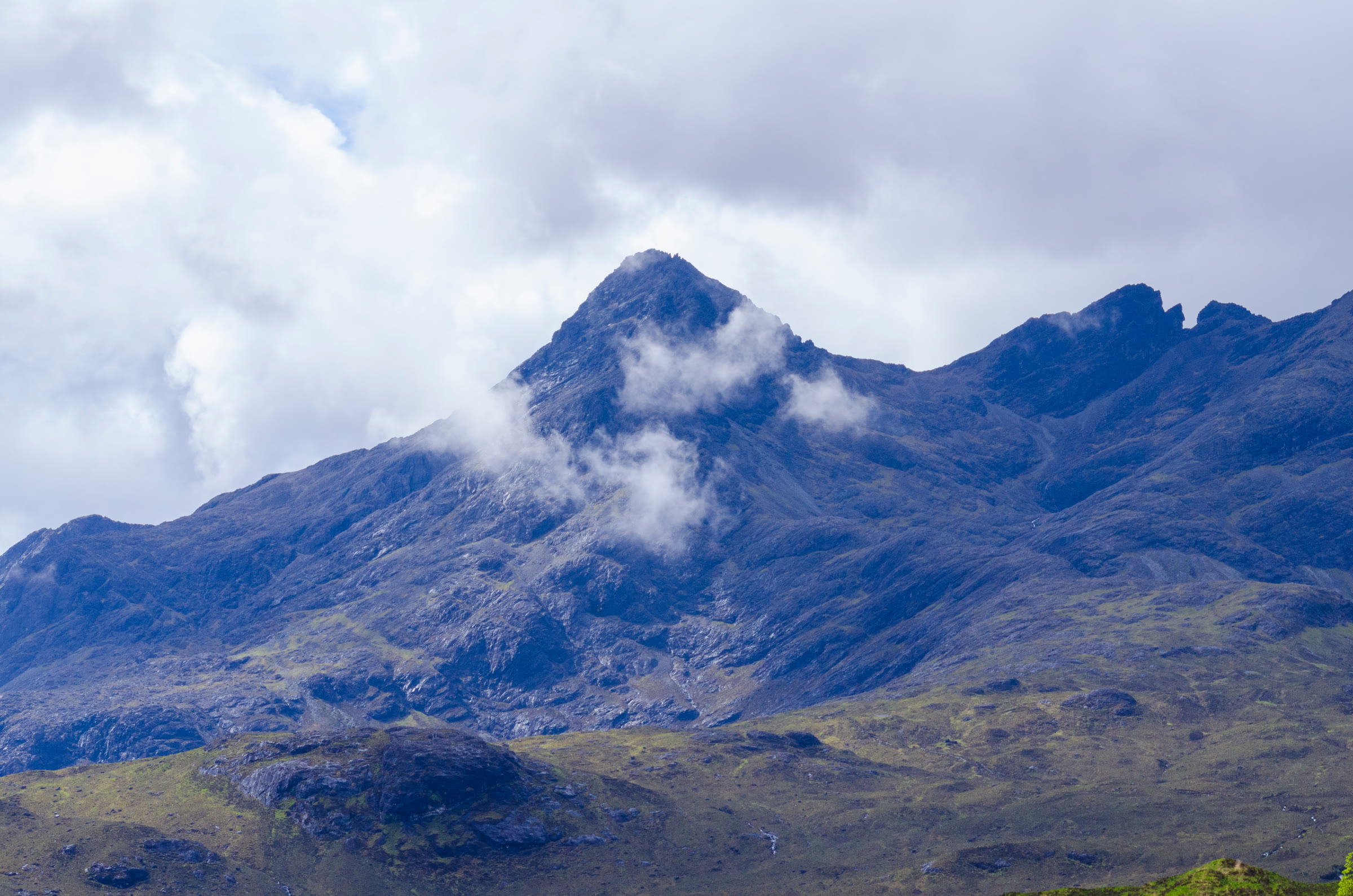 Sgùrr nan Gillean with cloud about its top, and Am Basteir and the Basteir Tooth along the ridge to its right.