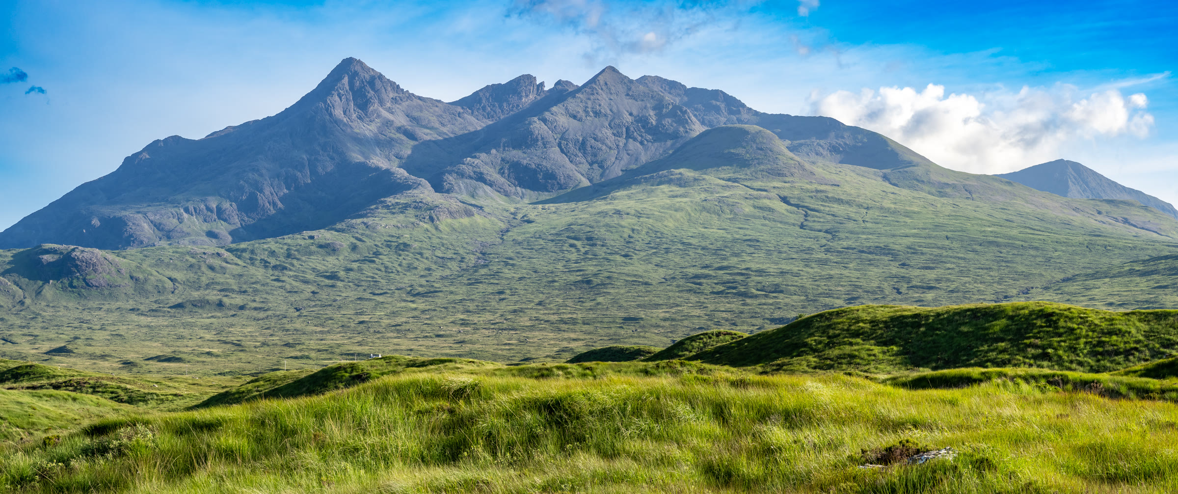 Sgùrr nan Gillean and the northern Cuillin above green moorland at Sligachan.