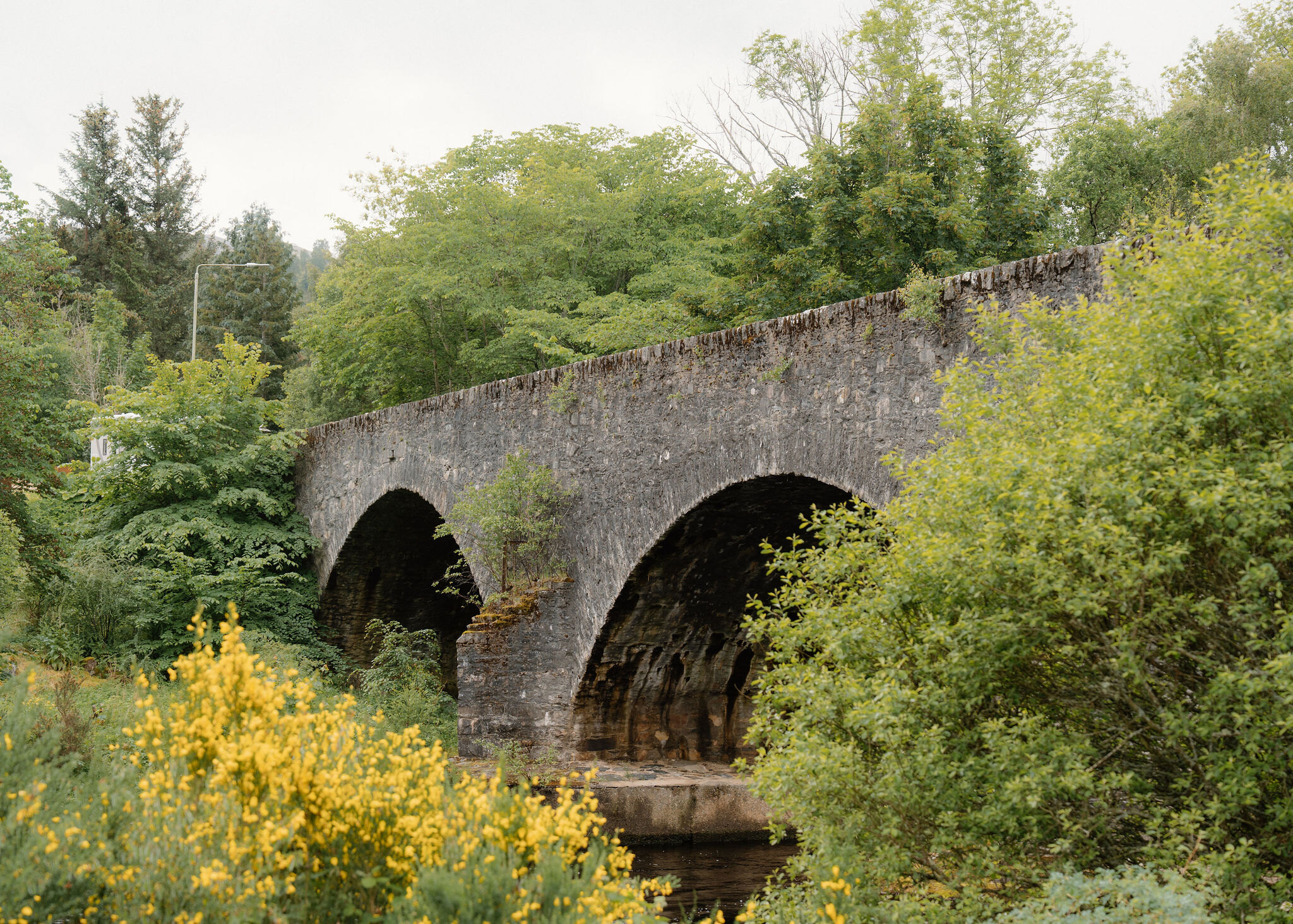 The riverside path and the Shed Gallery in Kinloch Rannoch
