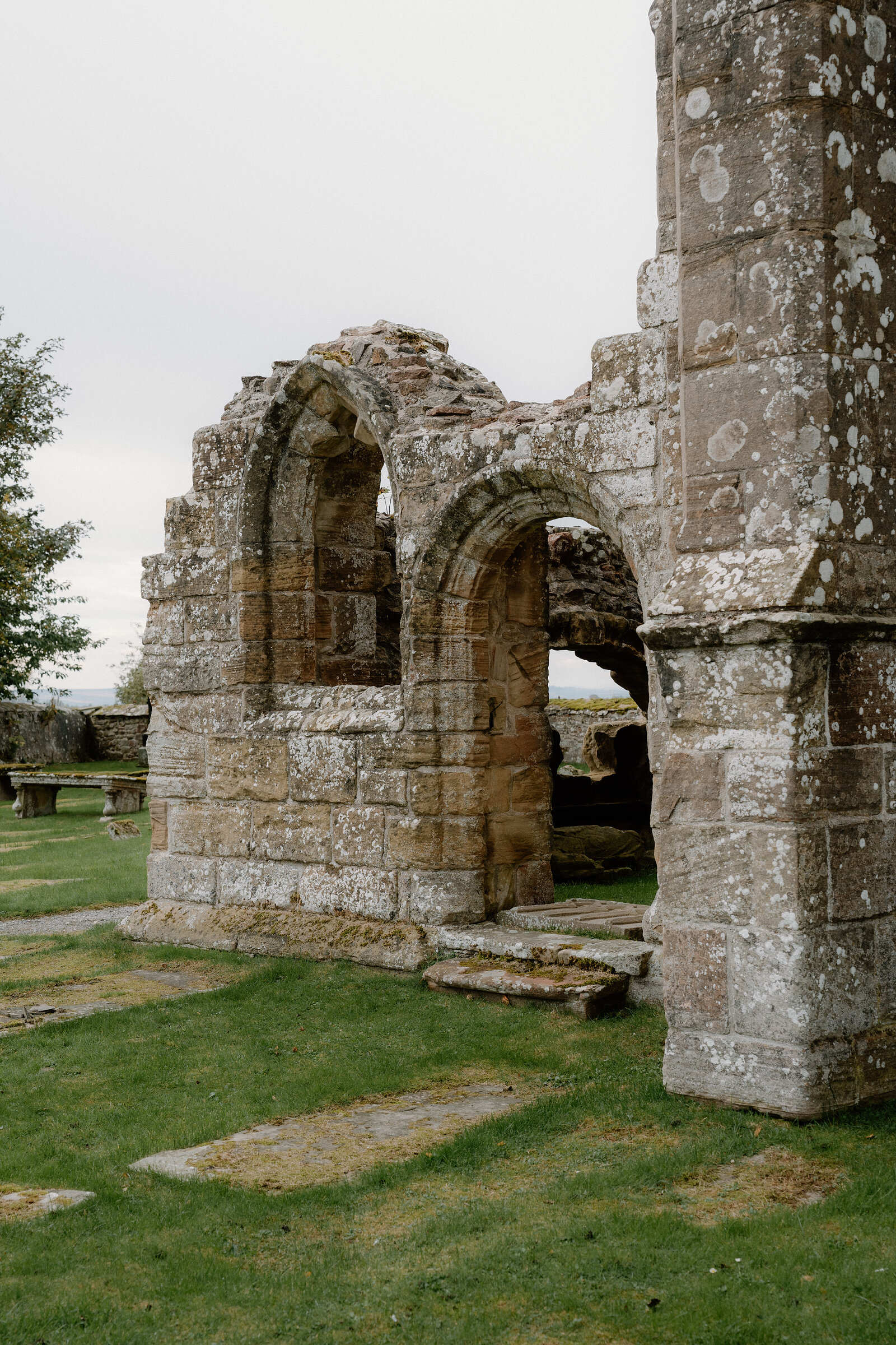 Arched stonework survives among the ruins of a Ross and Cromarty church.