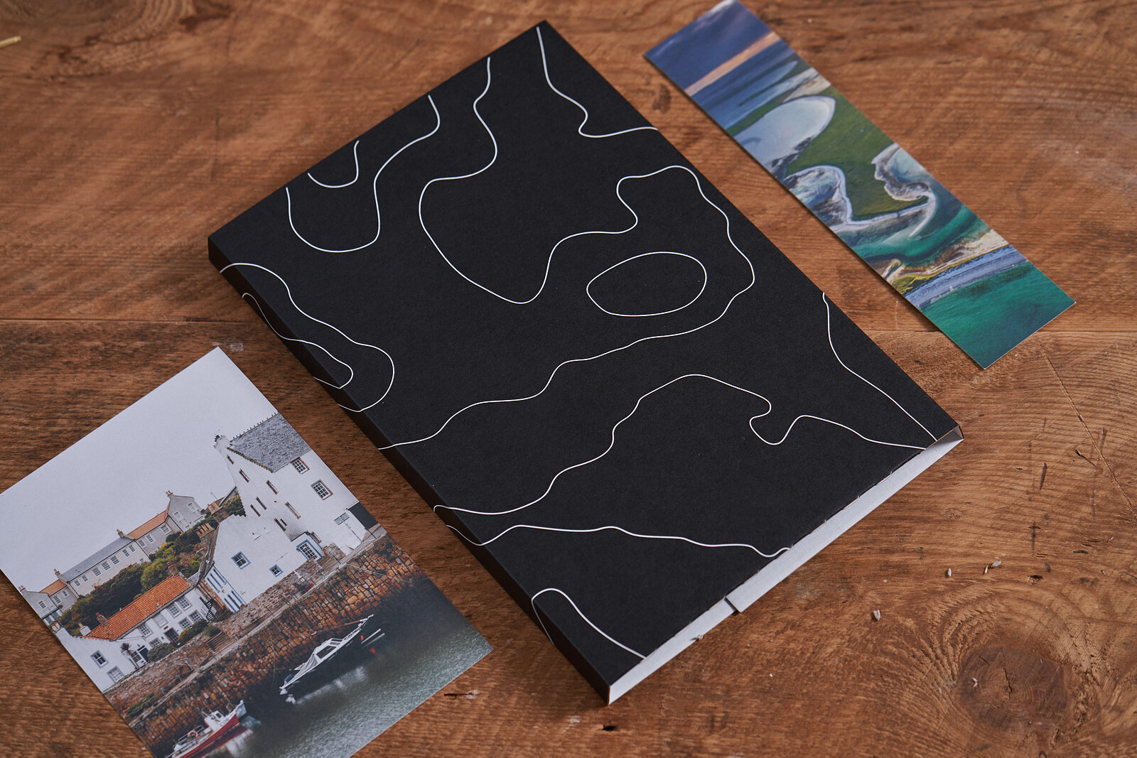 The black sleeve, the cover print and the bookmark