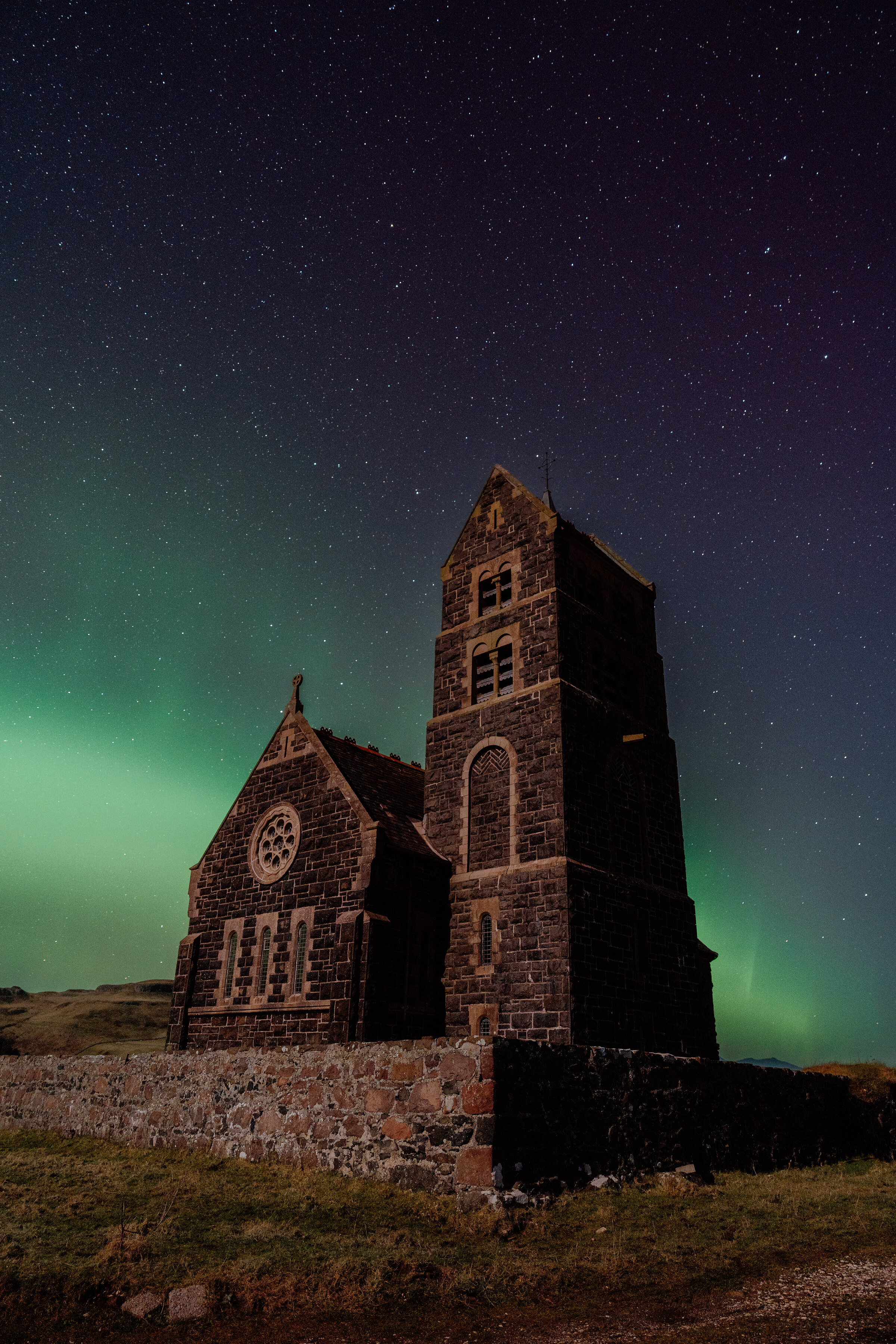 The northern lights over the Rhu Church on Canna, in the Small Isles.