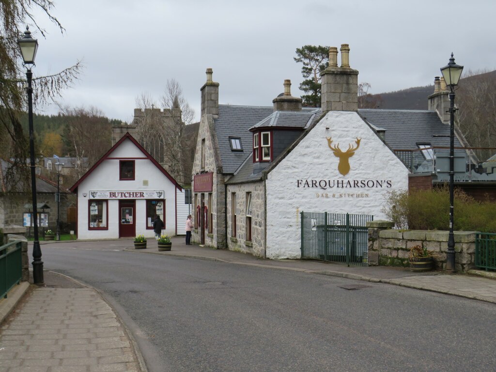 The white front of Farquharson's in the middle of Braemar.