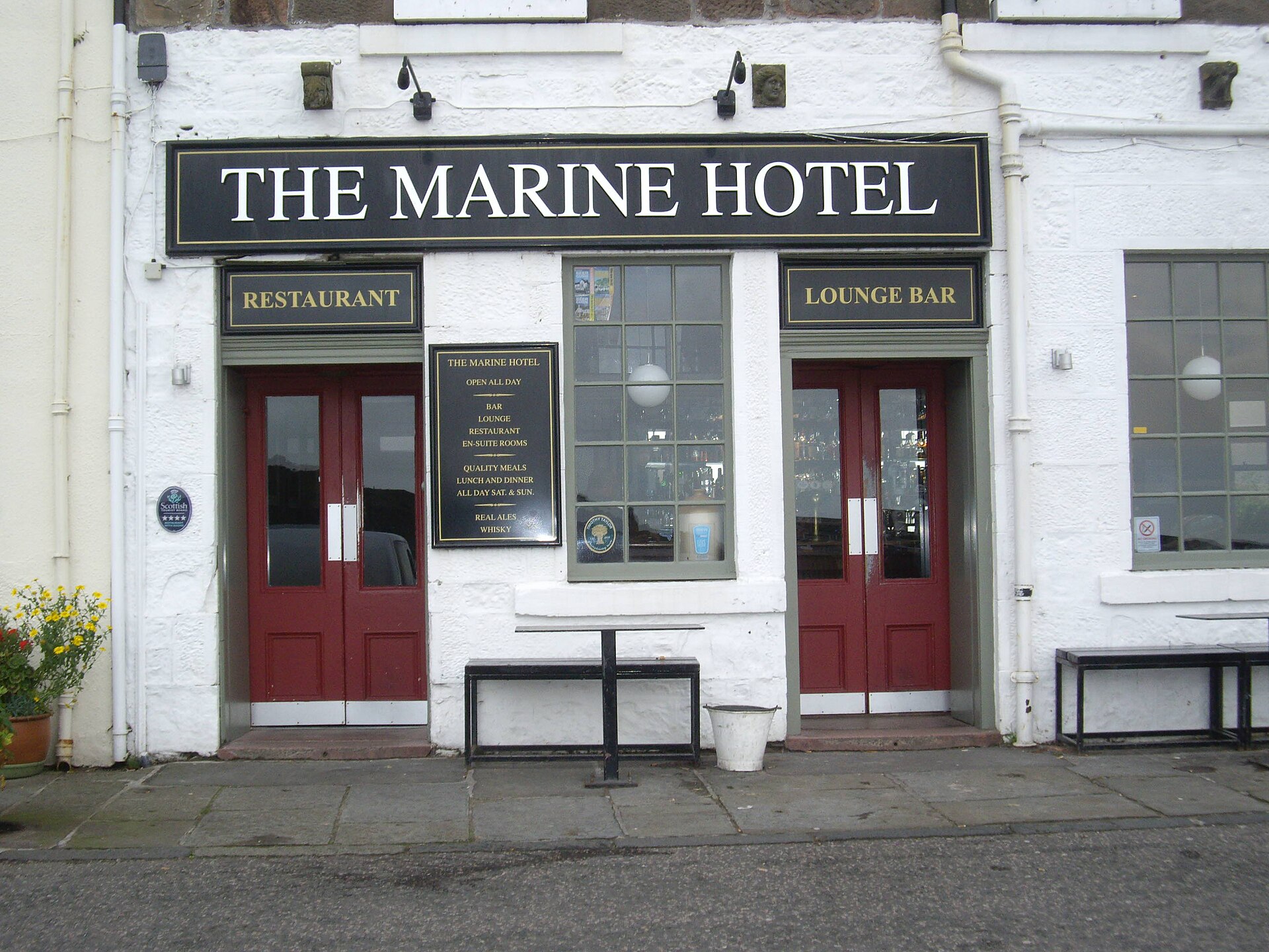 The white front of the Marine Hotel on the harbour at Stonehaven.