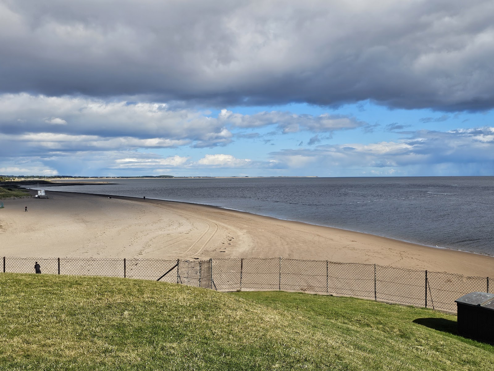 Broughty Ferry beach curving along the Tay under a big sky.