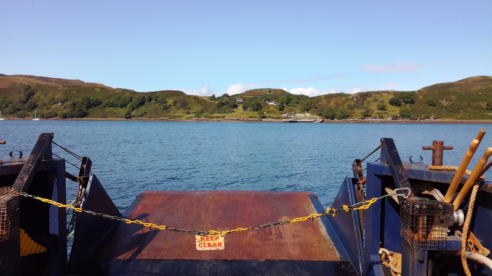 The ferry's ramp and the island across the sound.