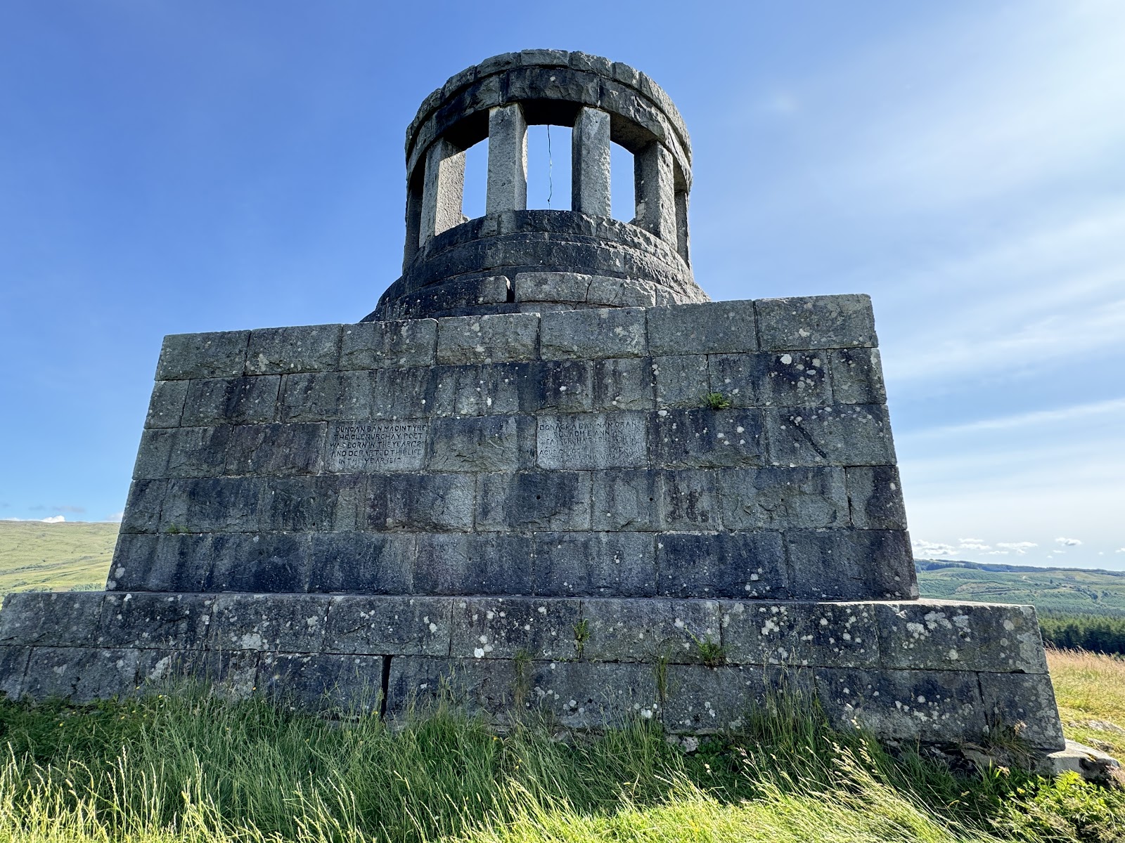 The granite monument with its round, pillared top.