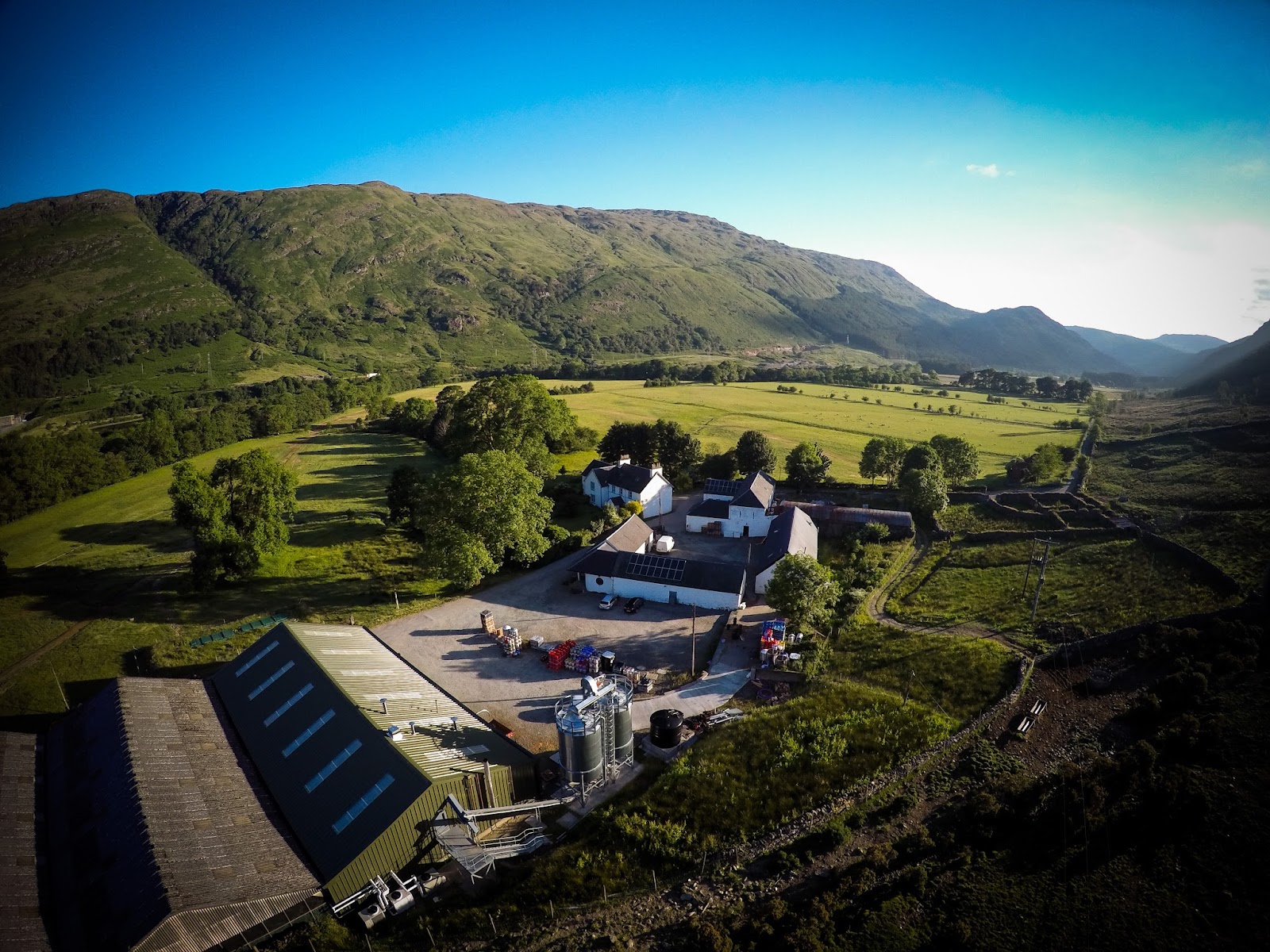 The Fyne Ales farm buildings in the glen from above.