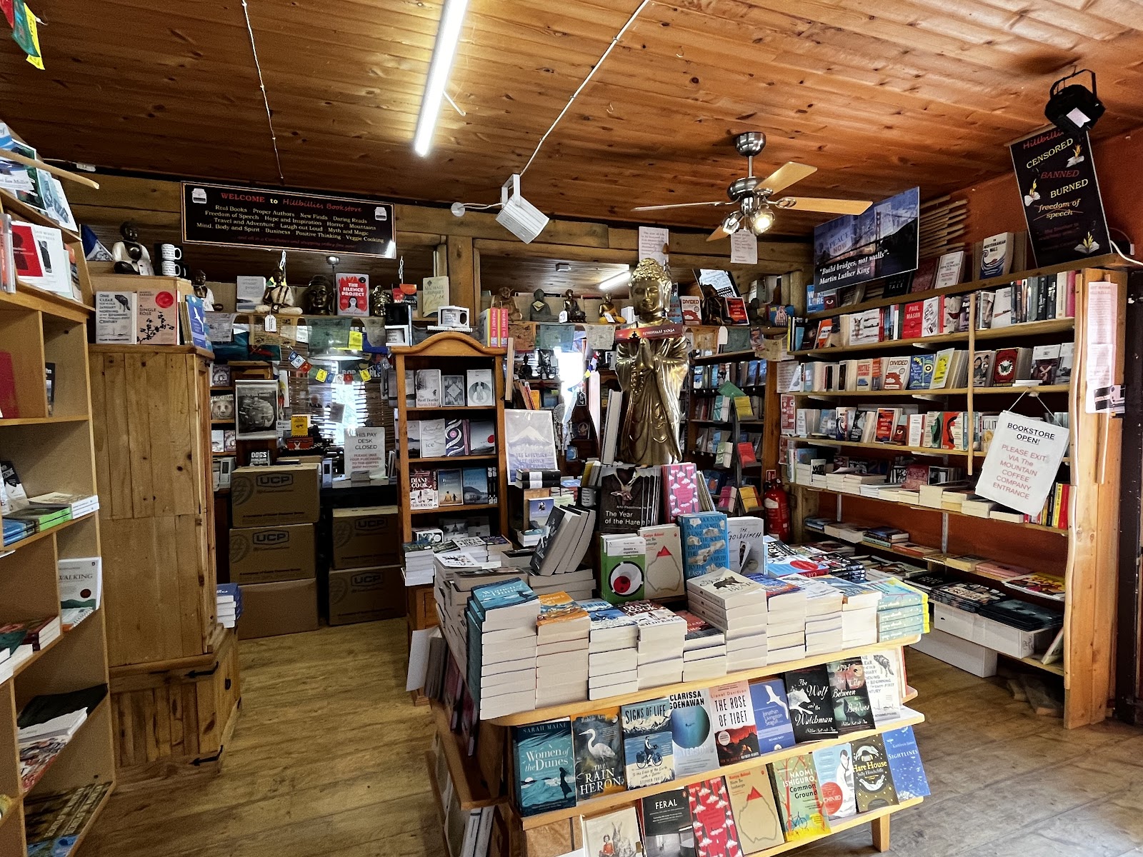 The crowded shelves and tables of the Hillbillies bookshop beside the Mountain Coffee Co in Gairloch.