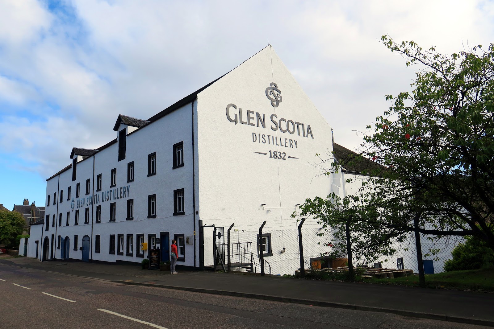Glen Scotia distillery's white front on the street.