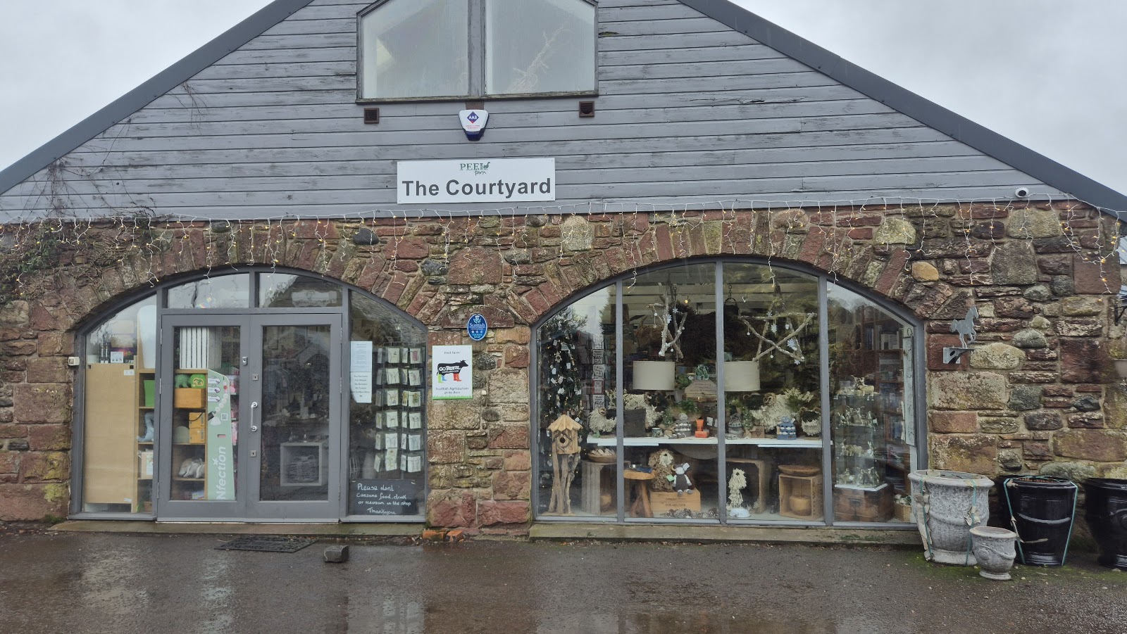The long stone front of the Peel Farm shop and coffee shop.
