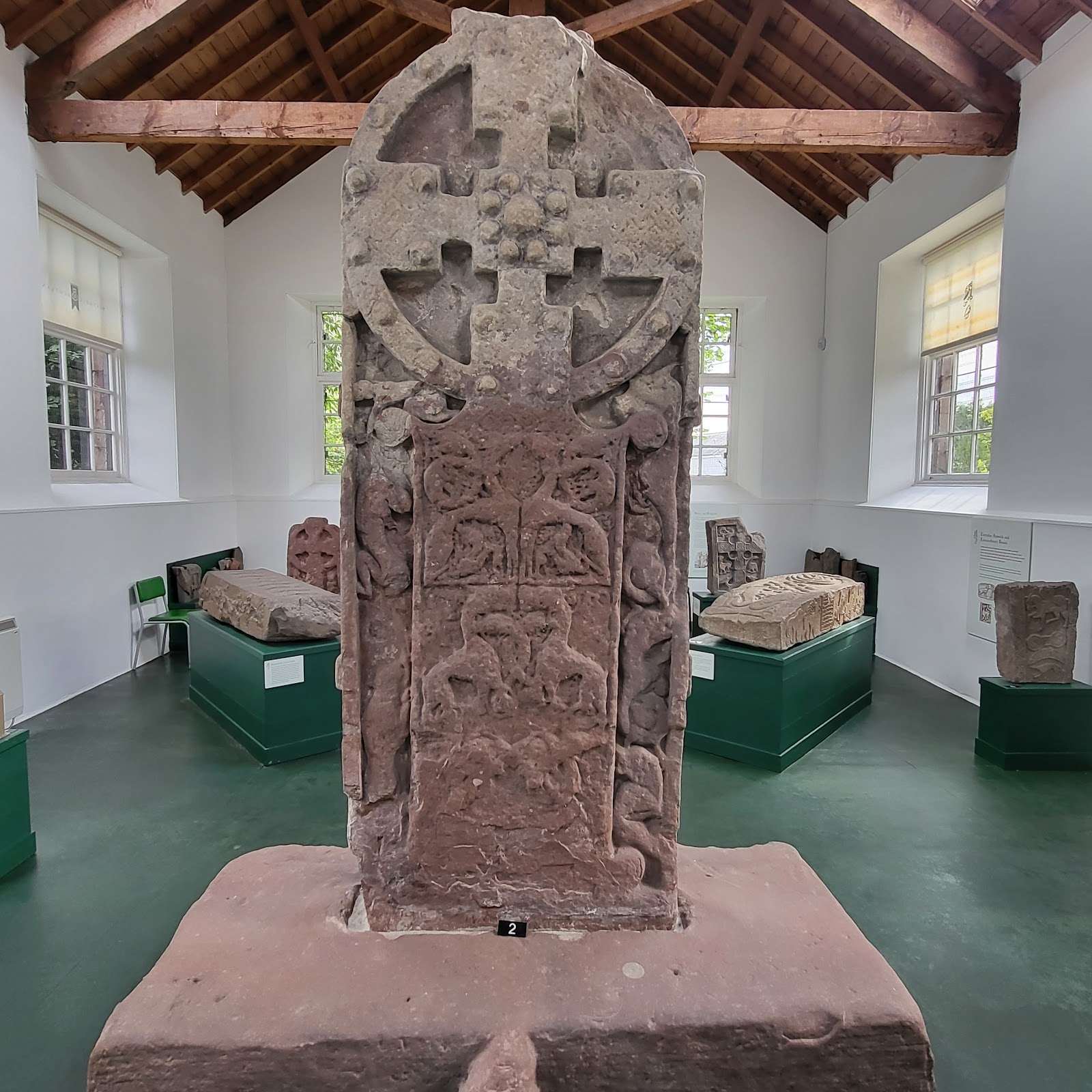 The great carved cross-slab standing in the hall of the Meigle Sculptured Stone Museum.