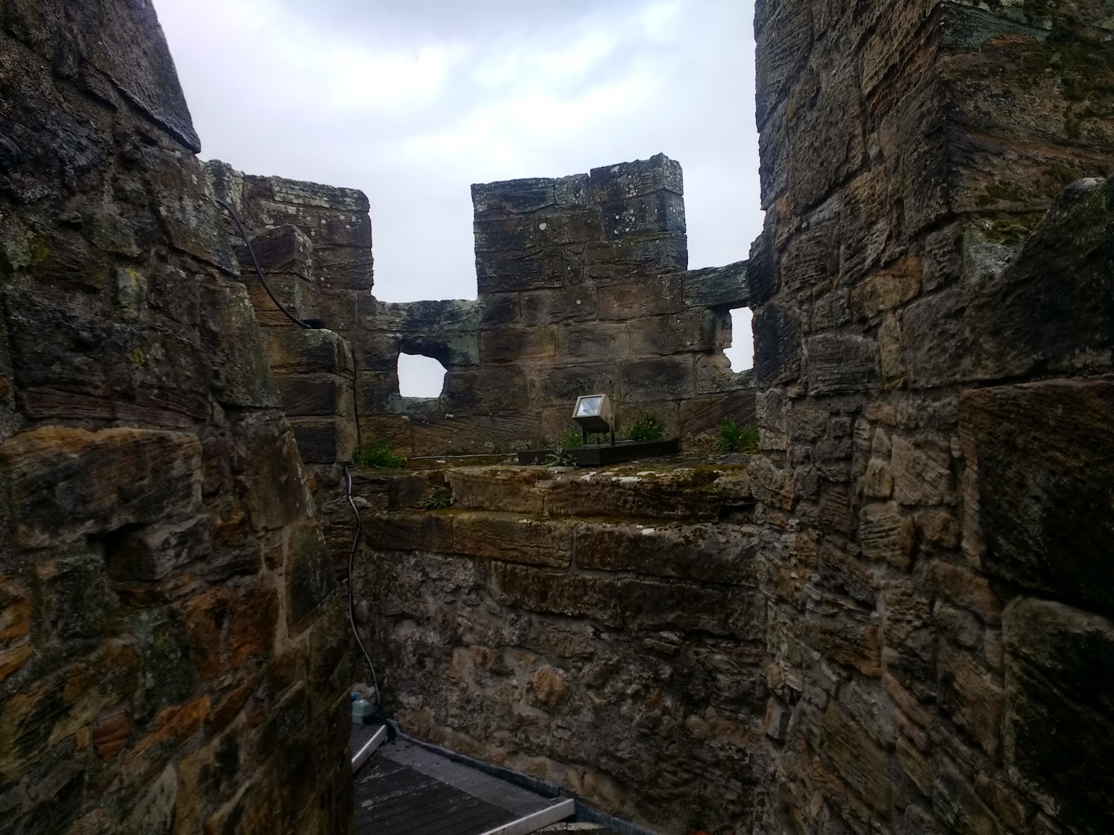 The roof walk inside the battlements at the top of the tower.