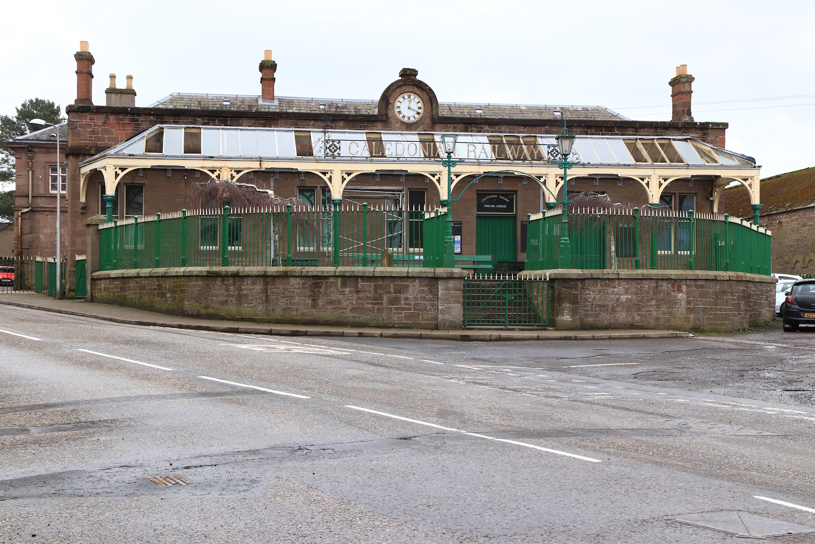 The green and cream station building of the Caledonian Railway at Brechin.