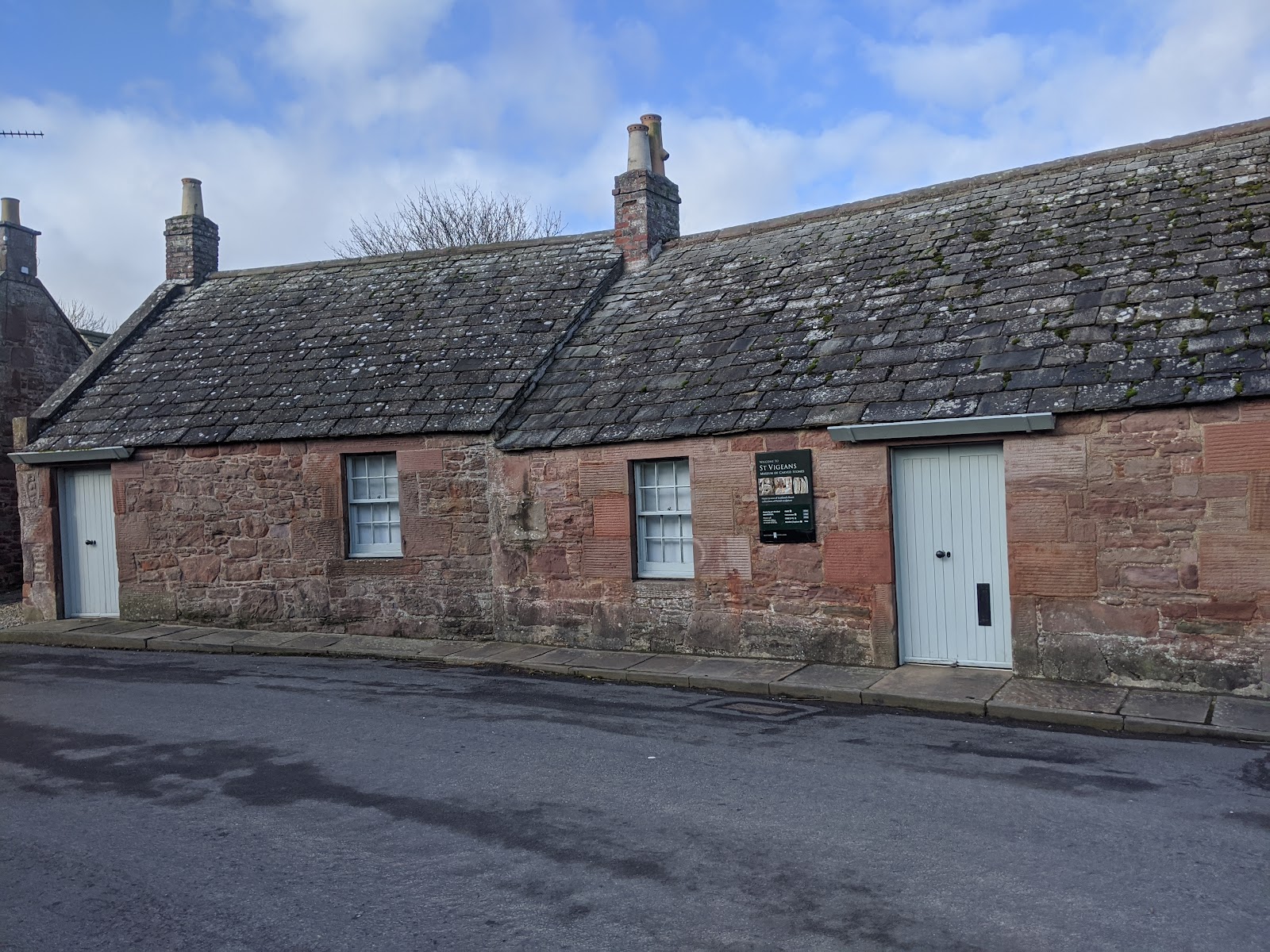 The row of sandstone cottages that house the St Vigeans stones.