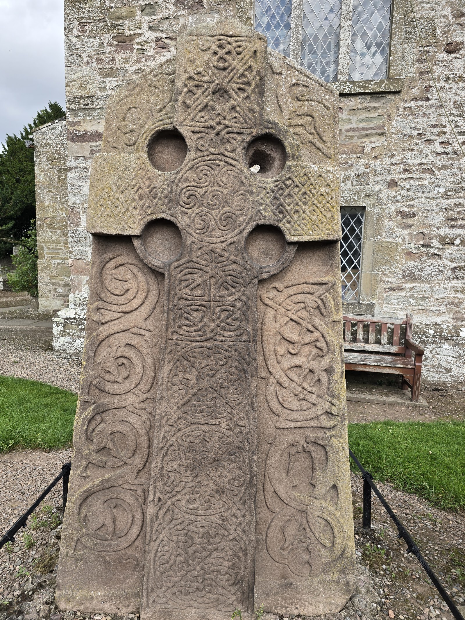 The carved Pictish cross-slab in Aberlemno kirkyard, covered in interlace.