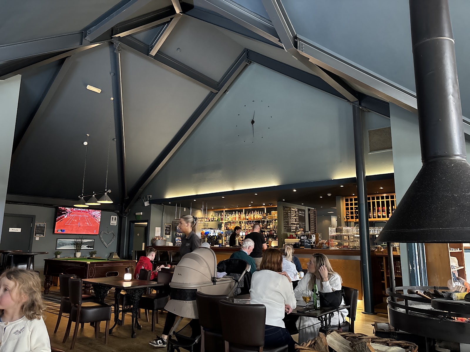 The dining room of the Courtyard under its high roof.