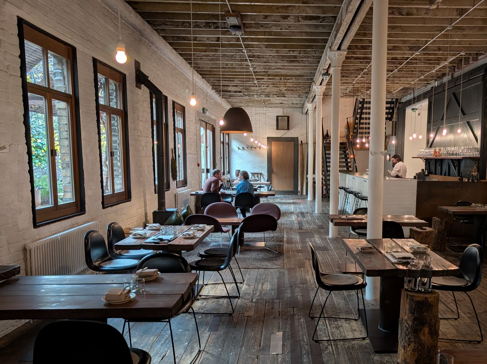 The long timber-floored dining room at Timberyard.