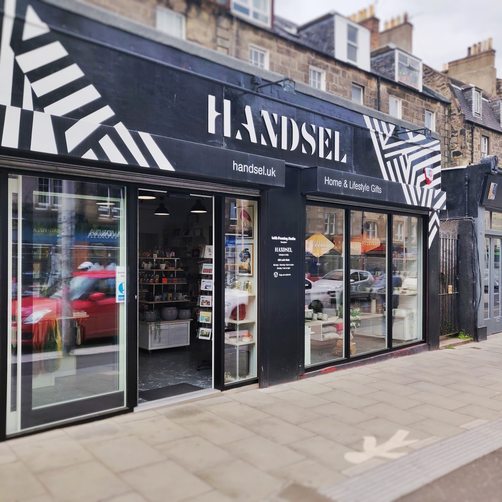 The black and white front of Handsel on Leith Walk, its name in white letters above the door and windows of homeware and gifts.