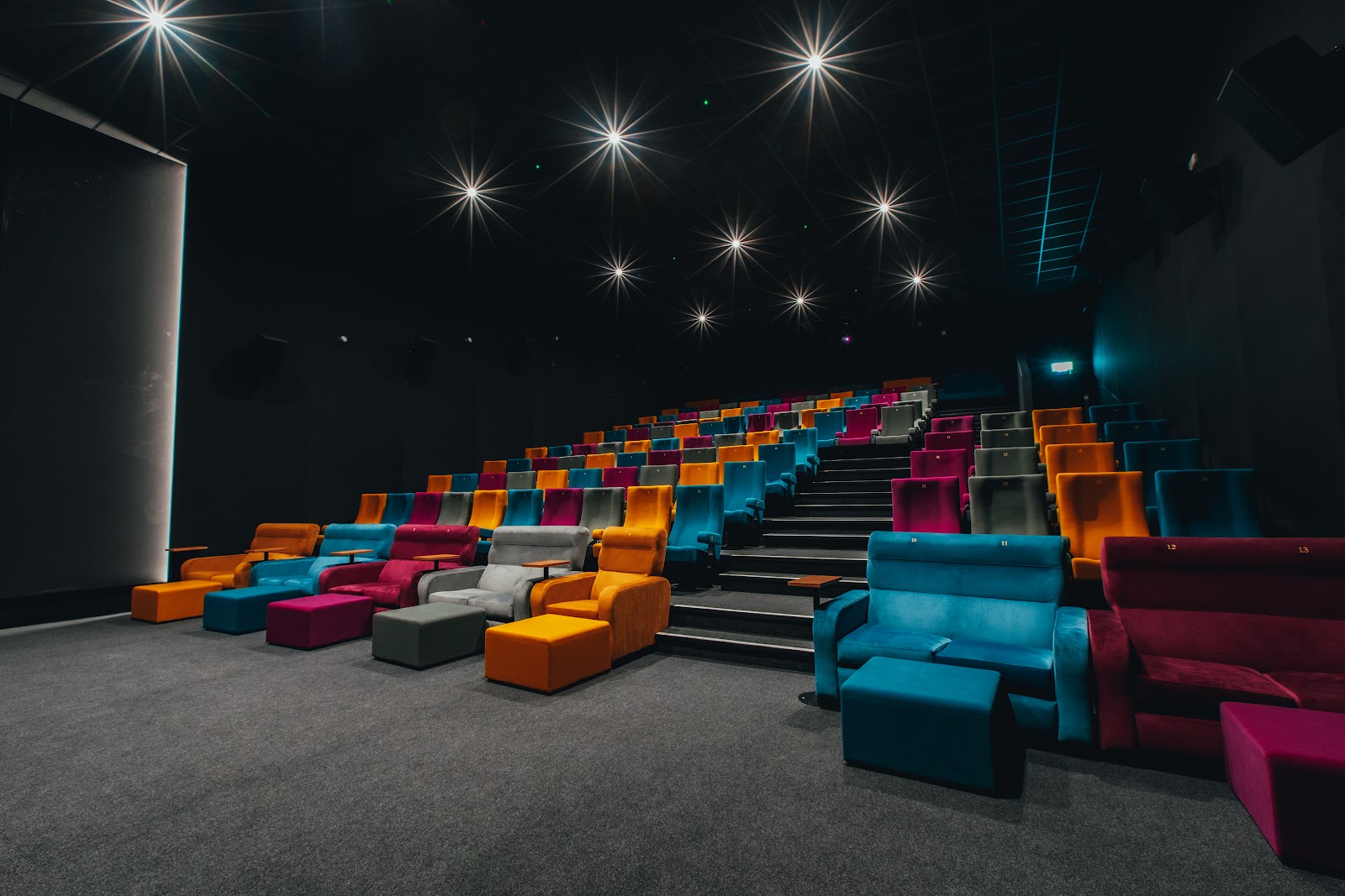 Bright rows of seats in a screen at the Montrose Playhouse.