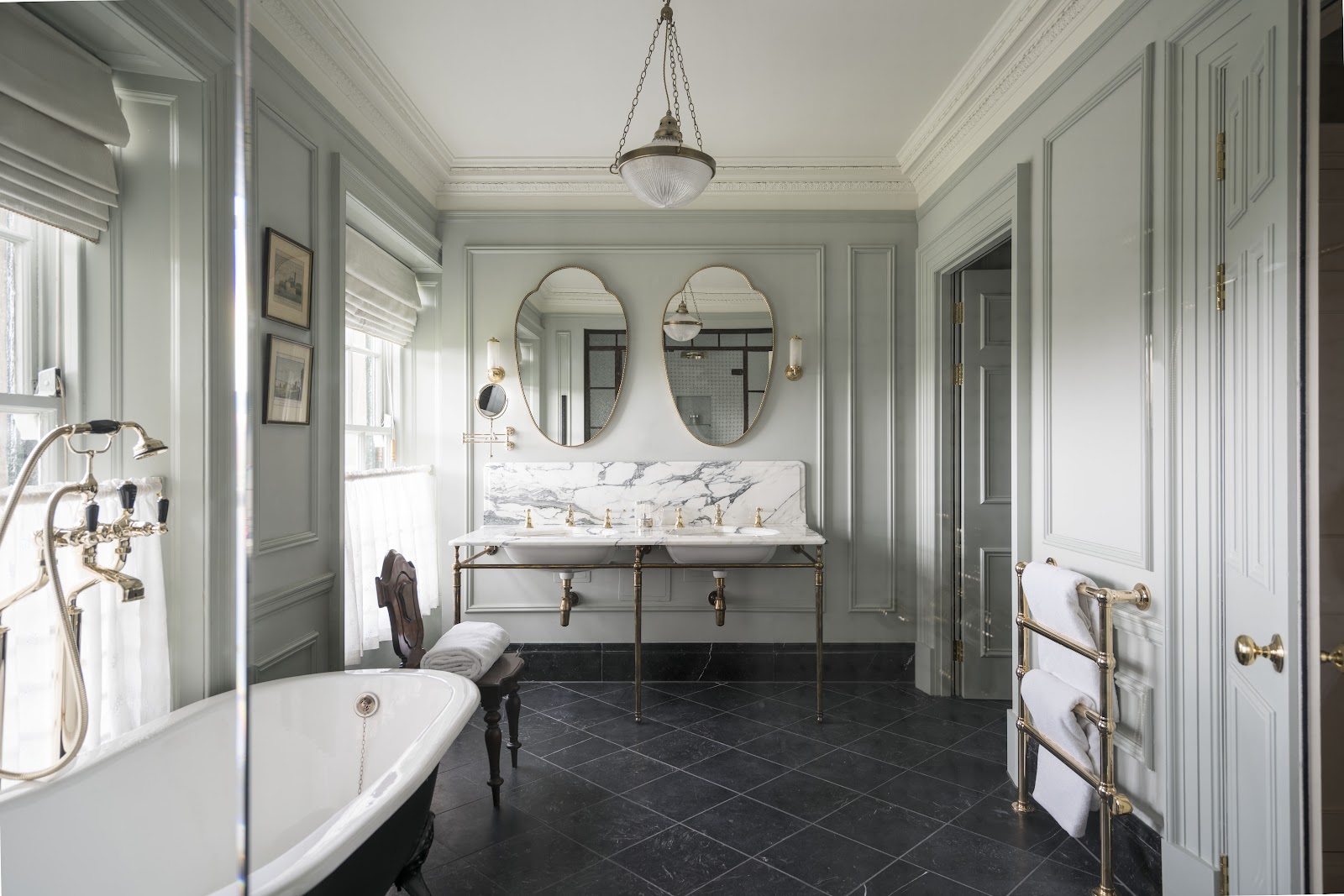 A marble bathroom with a roll-top bath at Gleneagles.