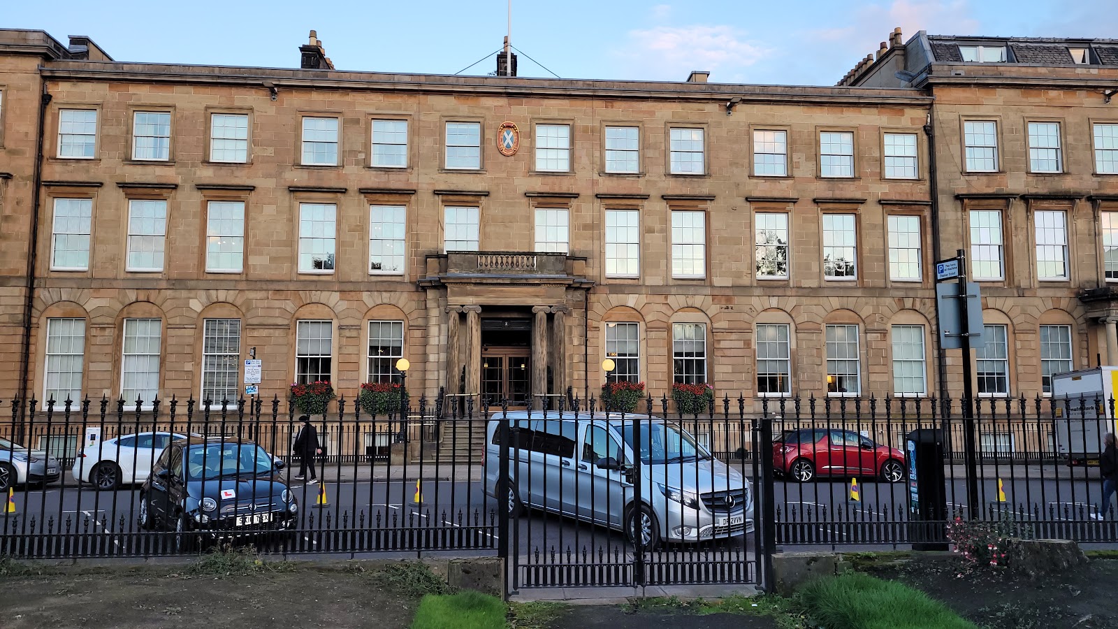 The Georgian terrace on Blythswood Square behind its railings.