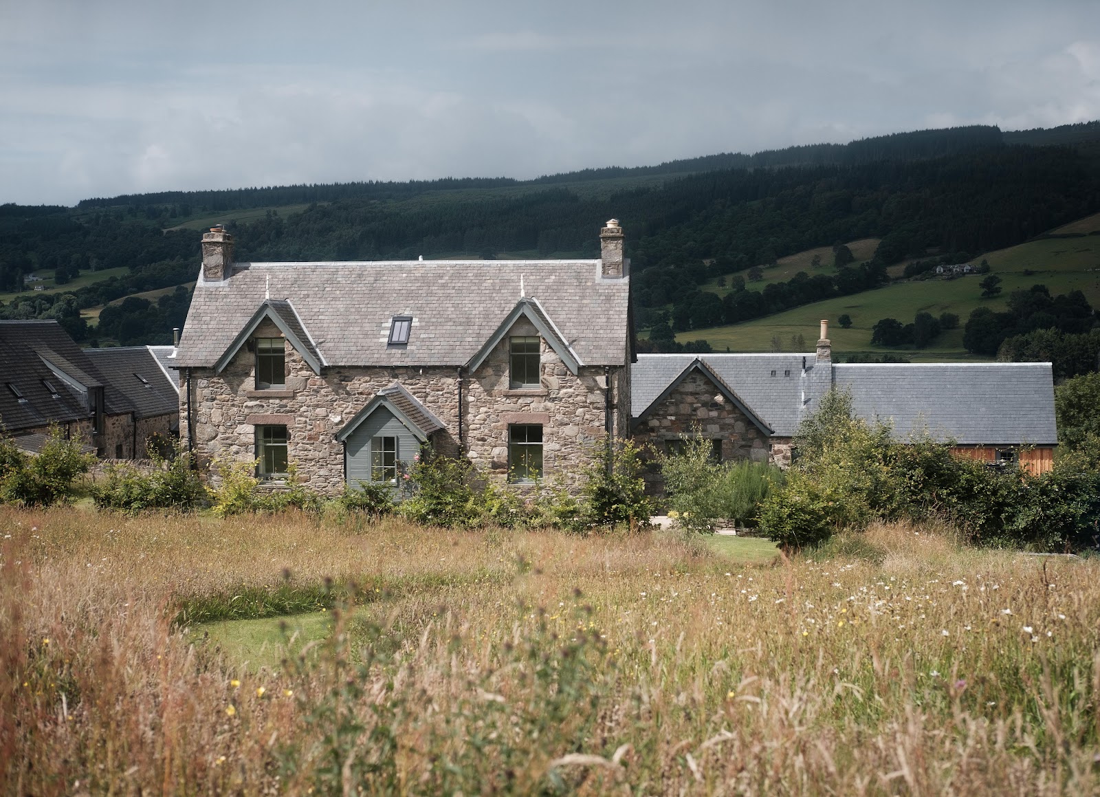 The stone farmhouse at Ballintaggart in its fields above Strathtay.