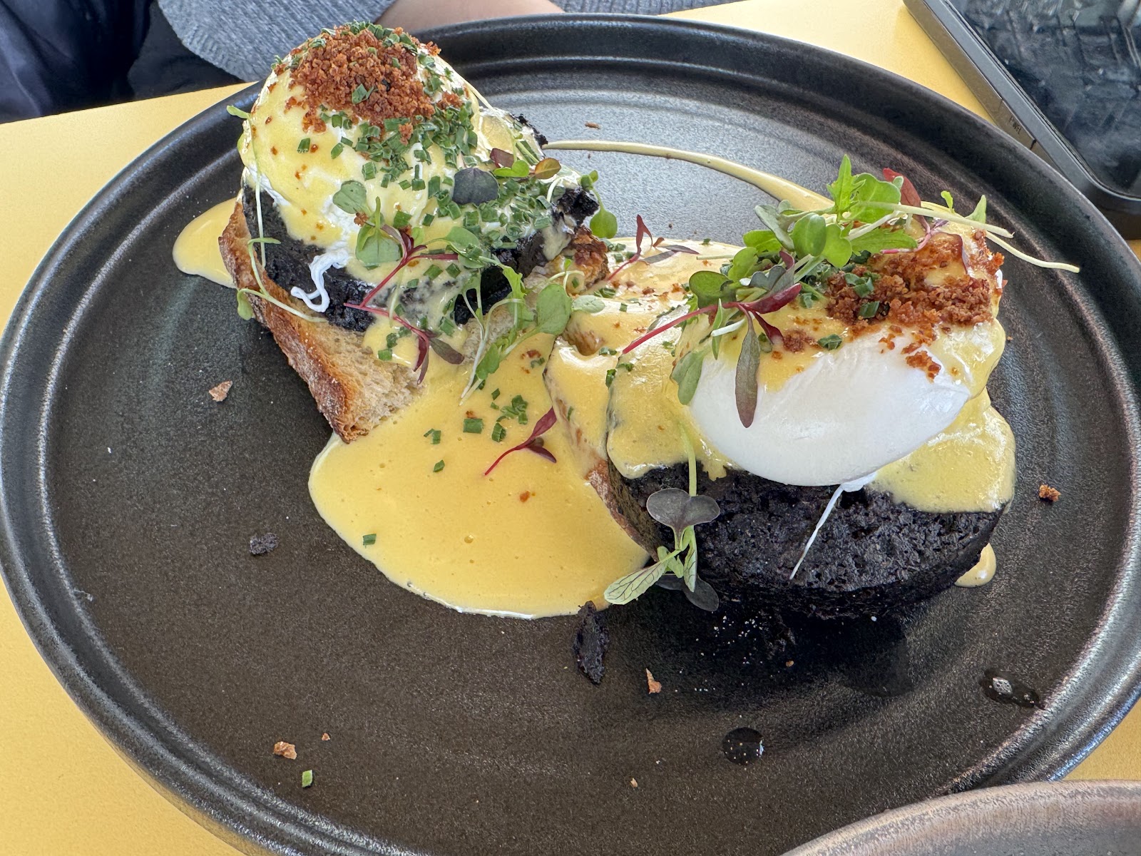 The Stornoway at Scran + Roadie: black pudding and poached eggs on sourdough with hollandaise and a bacon crumb.