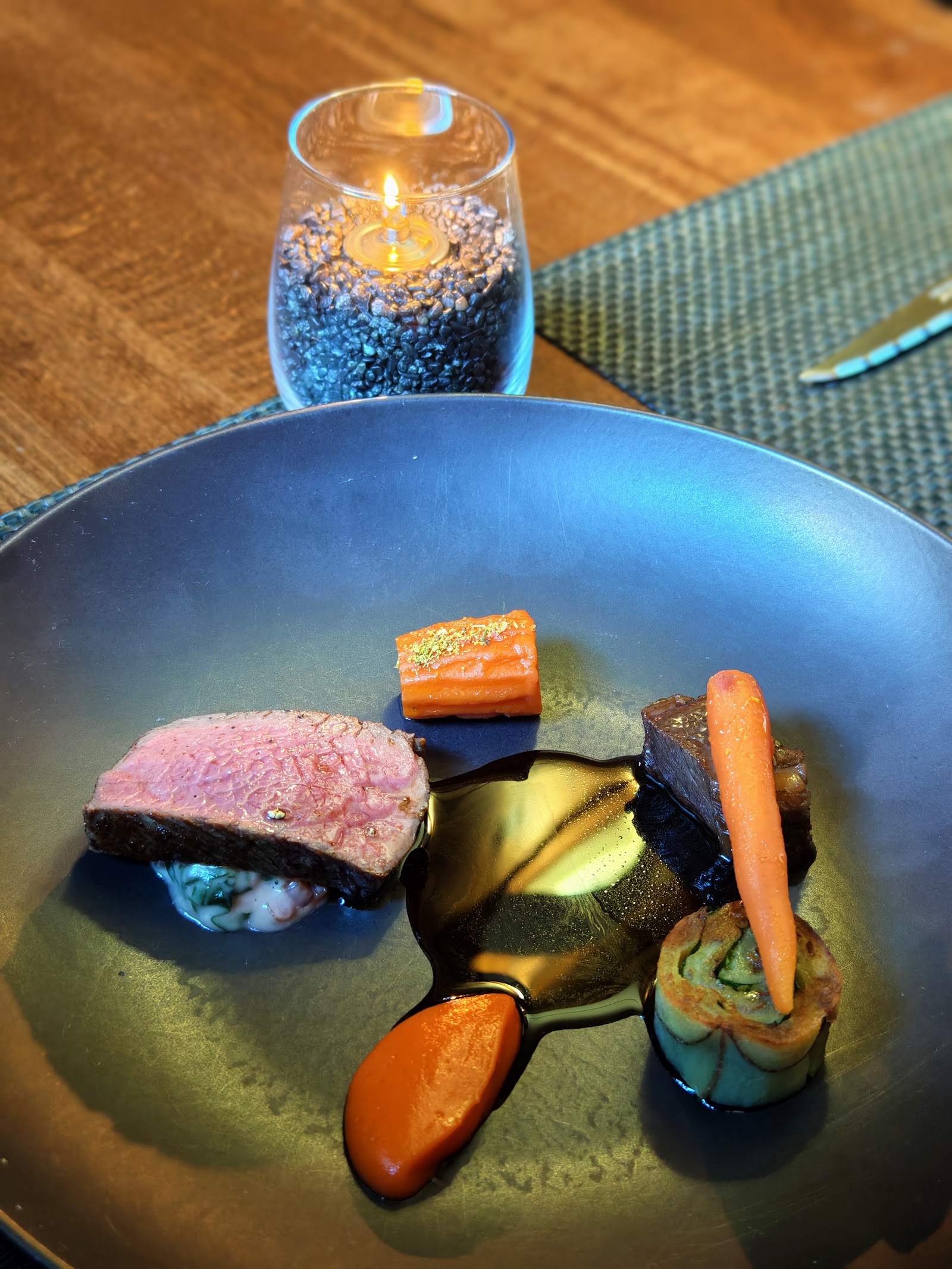 A plate of lamb from the tasting menu at Purslane.